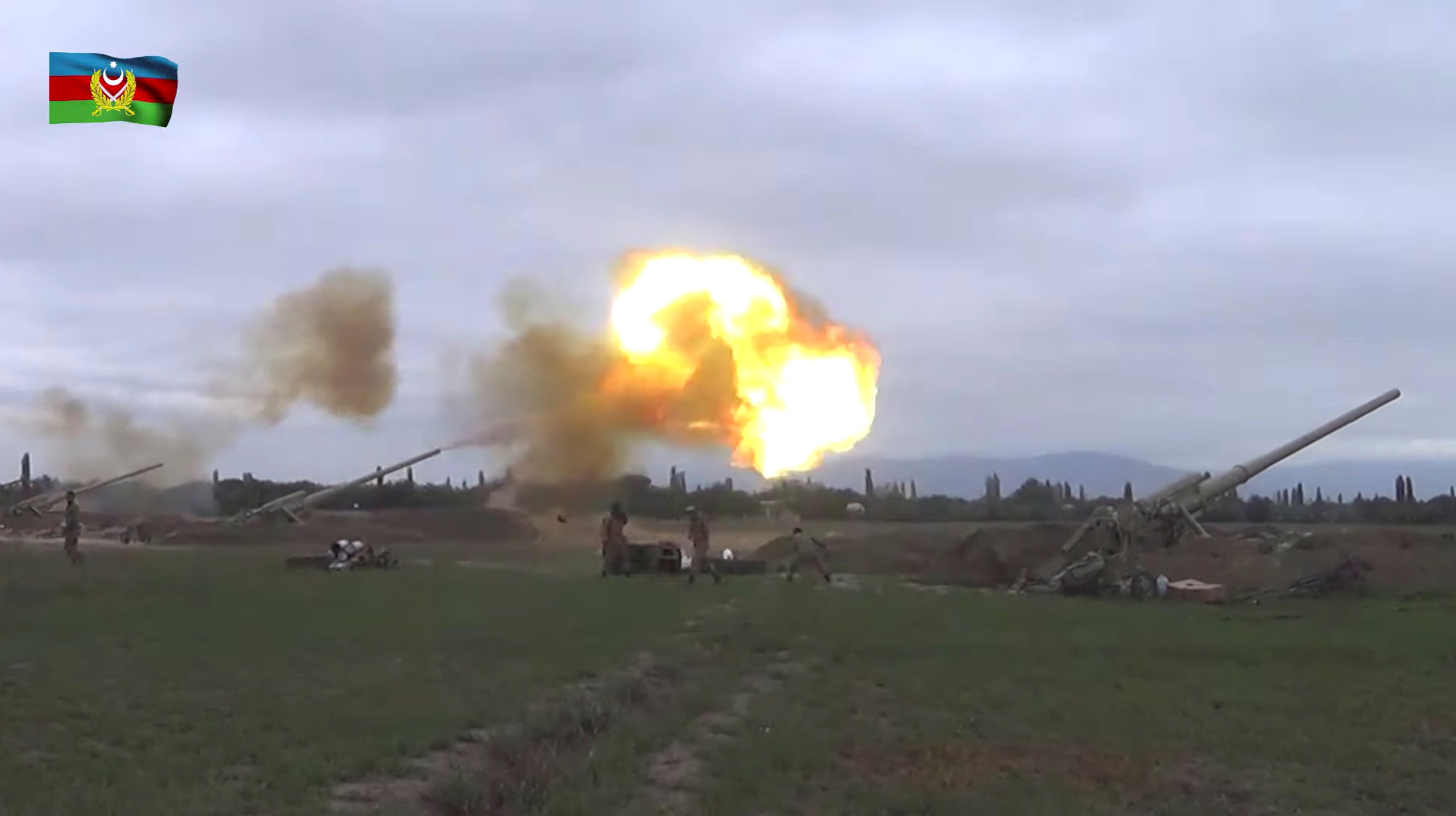A still image from a video released by the Azerbaijan's Defence Ministry shows members of Azeri armed forces firing artillery during clashes between Armenia and Azerbaijan over the territory of Nagorno-Karabakh in an unidentified location, in this still image from footage released September 28, 2020. Defence Ministry of Azerbaijan
