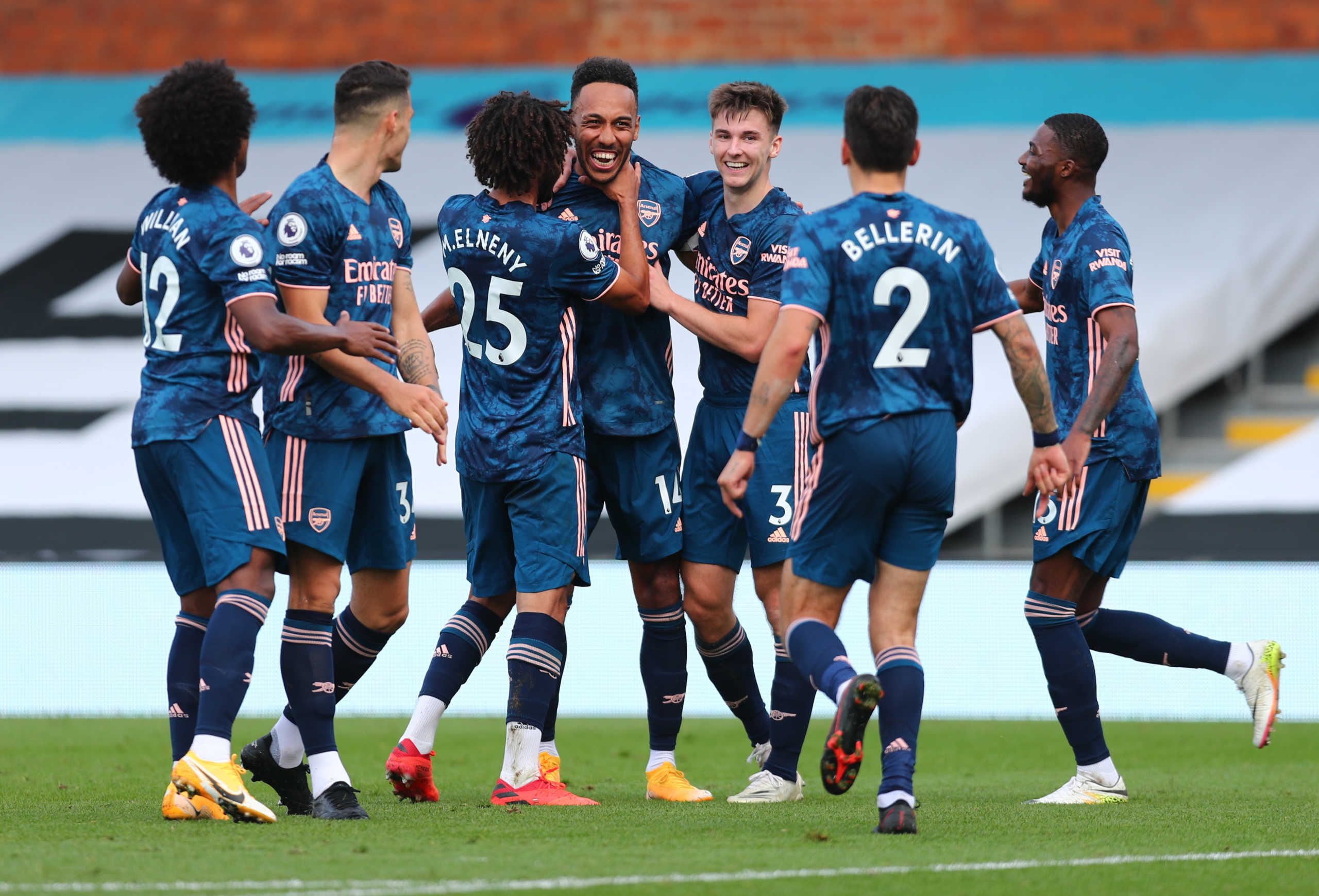 Soccer Football - Premier League - Fulham v Arsenal - Craven Cottage, London, Britain - September 12, 2020 Arsenal's Pierre-Emerick Aubameyang celebrates scoring their third goal with teammates Pool via REUTERS