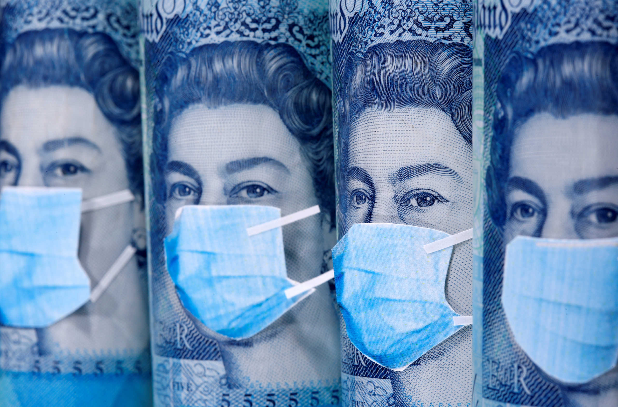 FILE PHOTO: Queen Elizabeth II is seen with printed medical masks on the Pound banknotes in this illustration taken, March 31, 2020. REUTERS