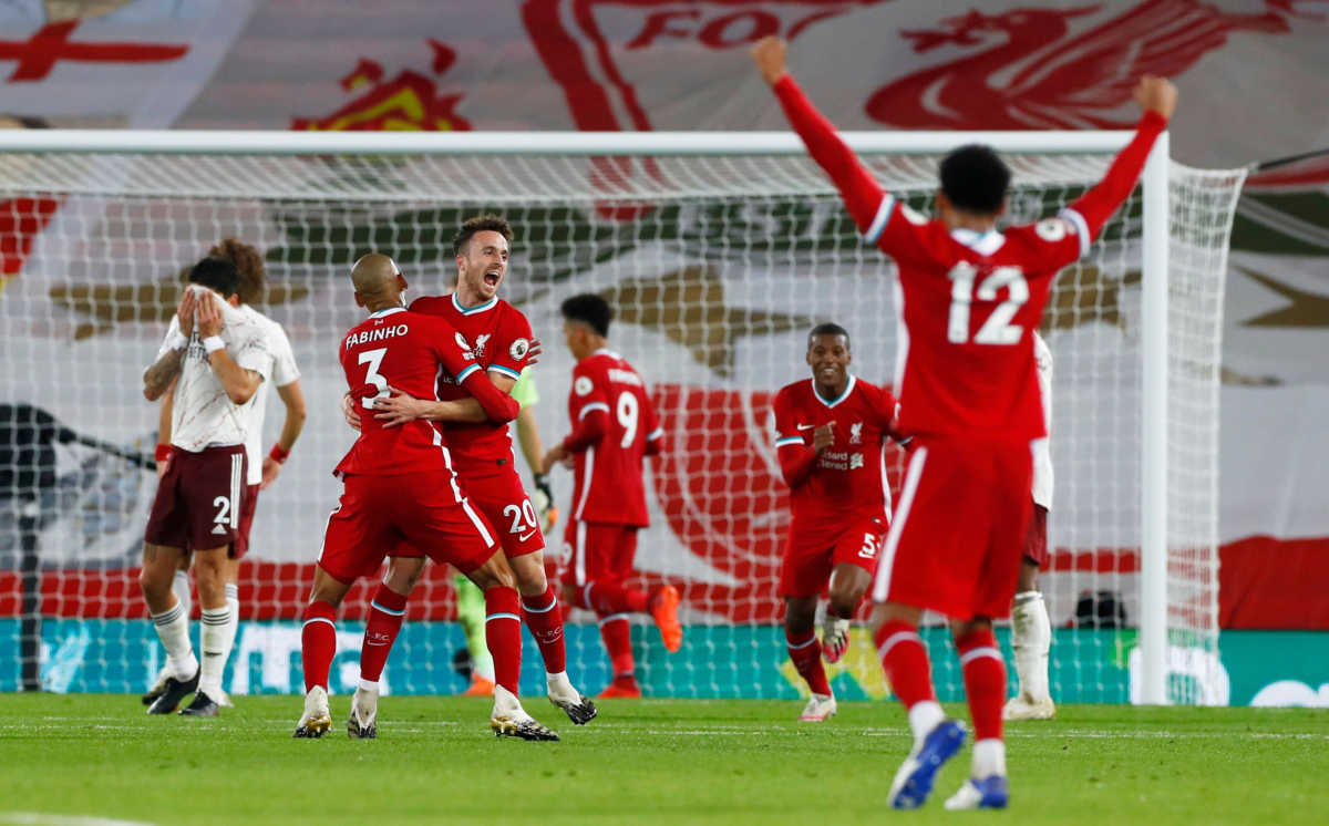 Soccer Football - Premier League - Liverpool v Arsenal - Anfield, Liverpool, Britain - September 28, 2020.  Liverpool's Diogo Jota celebrates scoring their third goal with teammates Pool via REUTERS
