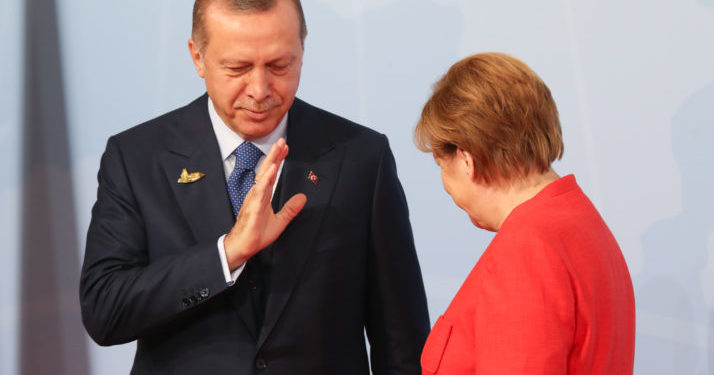 HAMBURG, GERMANY - JULY 07:  German Chancellor Angela Merkel (R) welcomes Turkish President Recep Tayyip Erdogan at the start of the the G20 summit on July 7, 2017 in Hamburg, Germany. Leaders of the G20 group of nations are meeting for the July 7-8 summit. Topics high on the agenda for the summit include climate policy and development programs for African economies.  (Photo by Matt Cardy