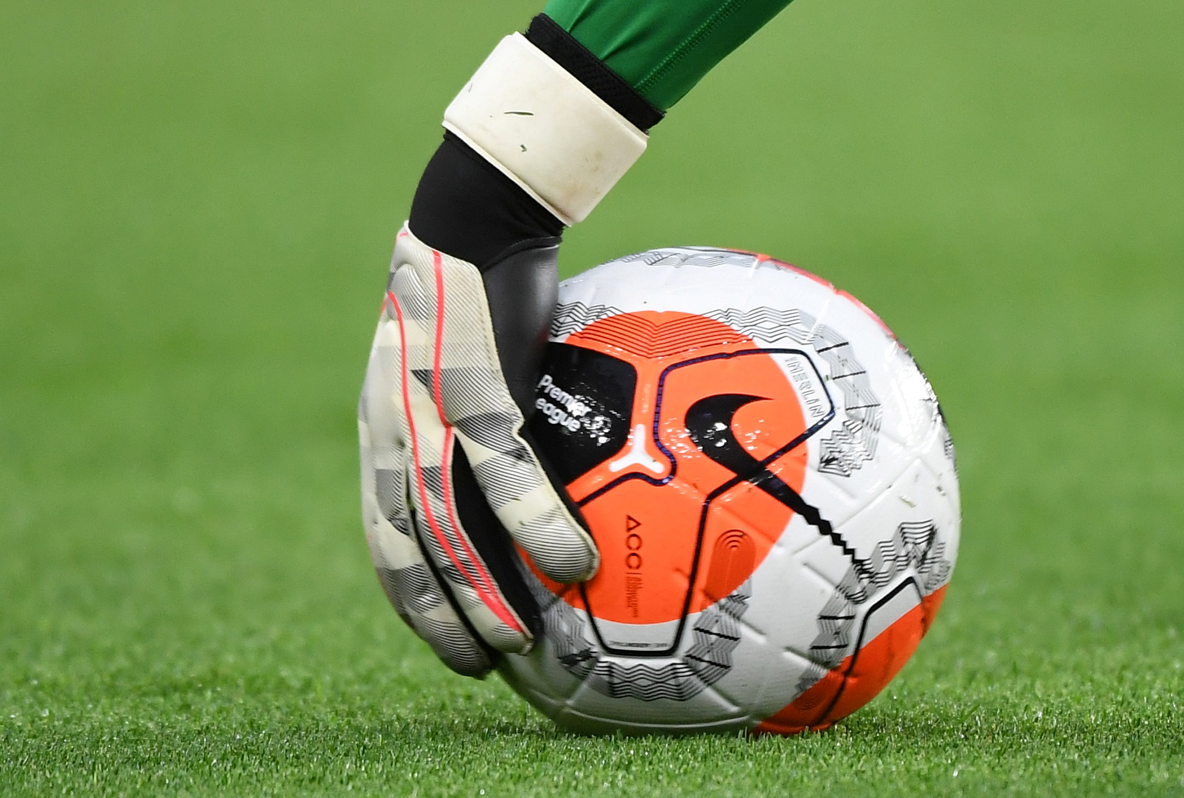FILE PHOTO: Soccer Football - Premier League - Brighton & Hove Albion v Manchester United - The American Express Community Stadium, Brighton, Britain - June 30, 2020  General view of the match ball, as play resumes behind closed doors following the outbreak of the coronavirus disease (COVID-19) Andy Rain