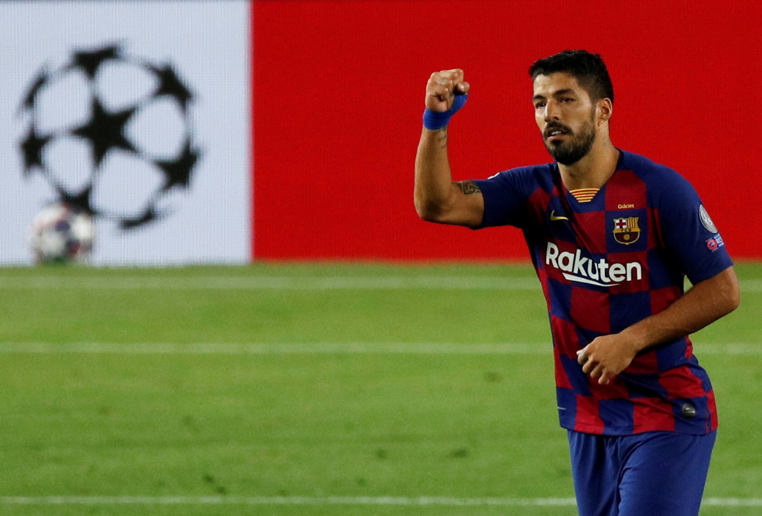 FILE PHOTO: Soccer Football - Champions League - Round of 16 Second Leg - FC Barcelona v Napoli - Camp Nou, Barcelona, Spain - August 8, 2020  Barcelona's Luis Suarez celebrates scoring their third goal, as play resumes behind closed doors following the outbreak of the coronavirus disease (COVID-19)  REUTERS