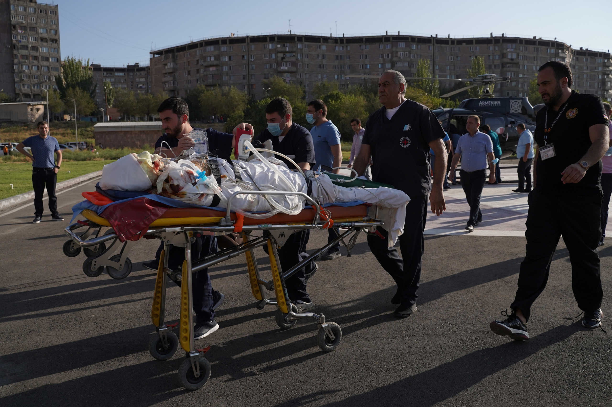An ethnic Armenian soldier, who was wounded in fighting with Azeri forces over the breakaway region of Nagorno-Karabakh, is carried on a stretcher after being transported by a helicopter to Erebouni Medical Center in Yerevan, Armenia September 29, 2020. Hakob Margaryan