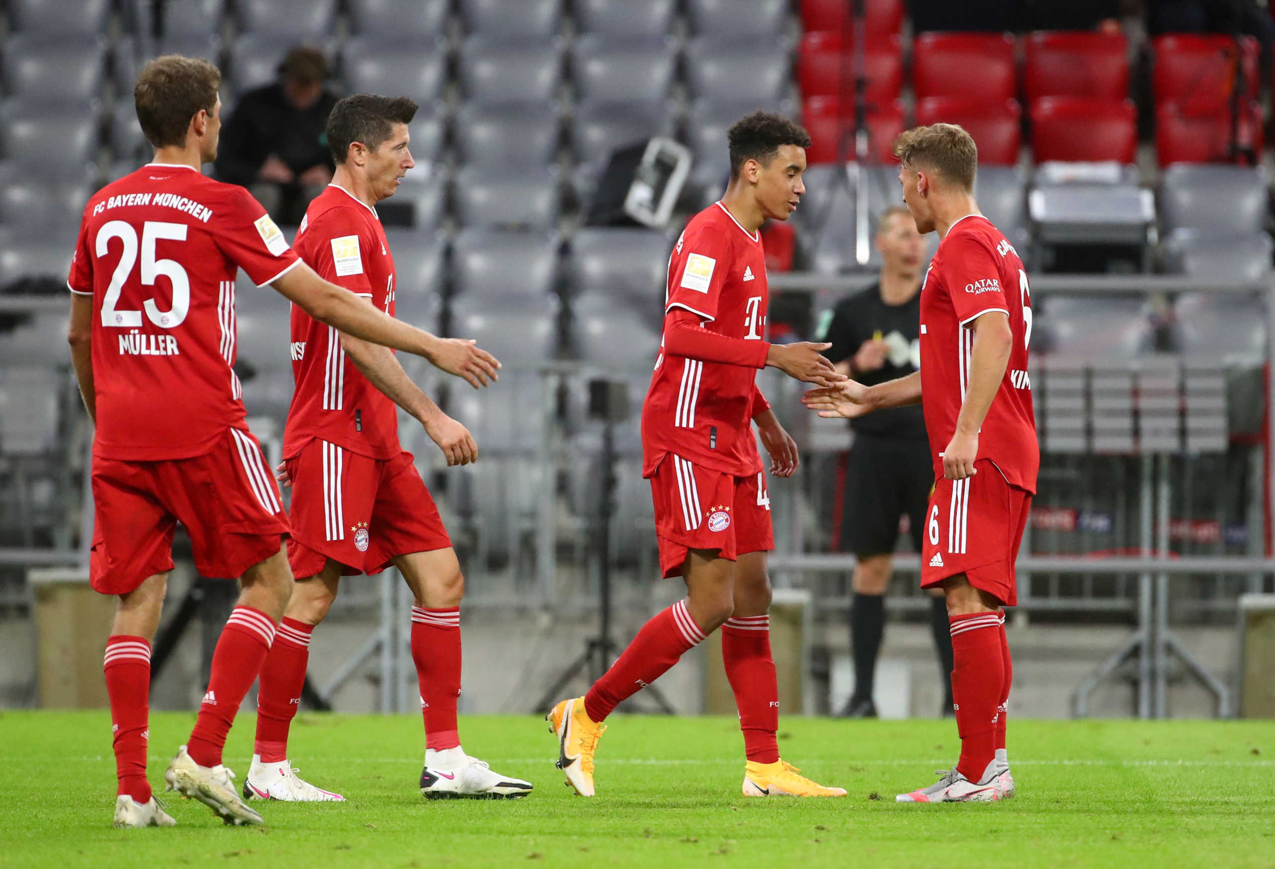 Soccer Football - Bundesliga - Bayern Munich v Schalke 04 - Allianz Arena, Munich, Germany - September 18, 2020  Bayern Munich's Jamal Musiala celebrates scoring their eighth goal with teammates  REUTERS