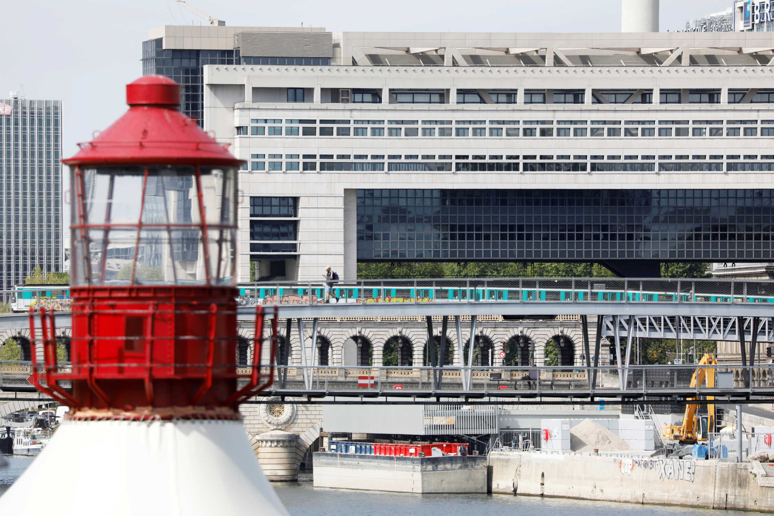 A metro passes by the Bercy Finance Ministry in Paris, France, September 3, 2020. REUTERS