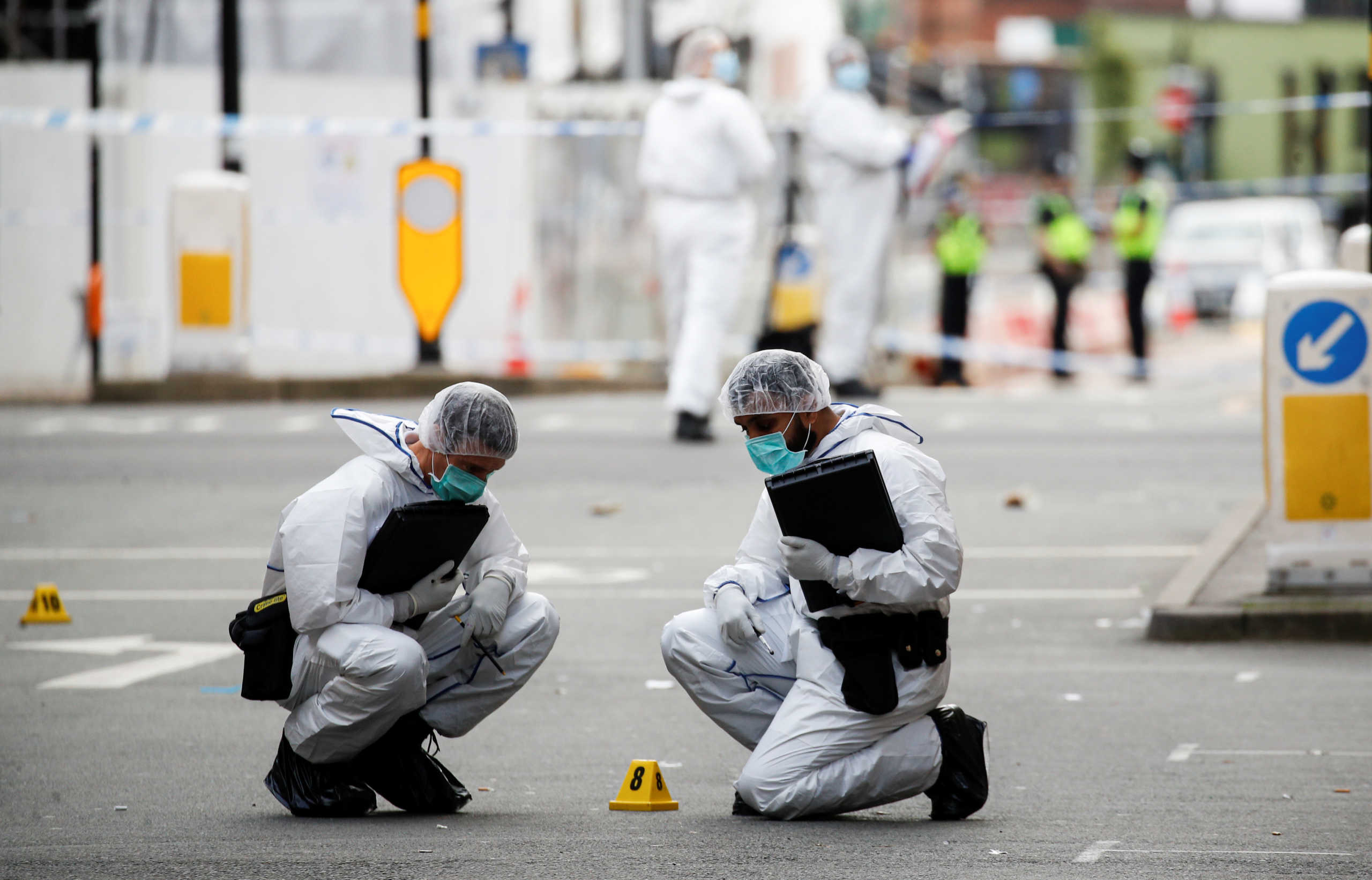 Forensics officers are seen near the scene of reported stabbings in Birmingham, Britain, September 6, 2020.  REUTERS