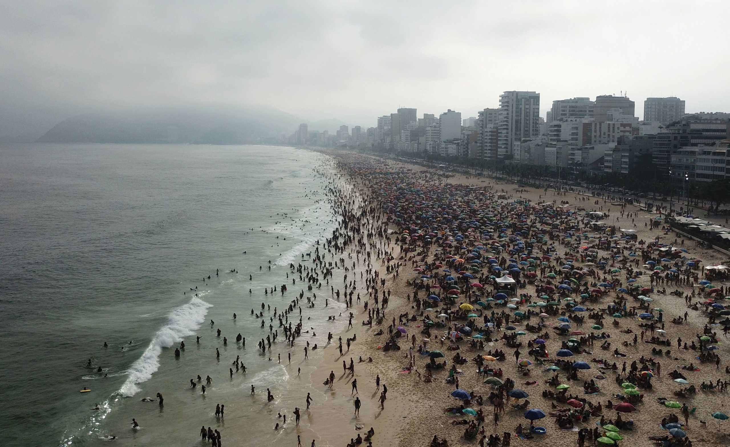 People visit Ipanema beach, amid the coronavirus disease (COVID-19) outbreak, in Rio de Janeiro, Brazil September 6, 2020. Picture taken with a drone. REUTERS