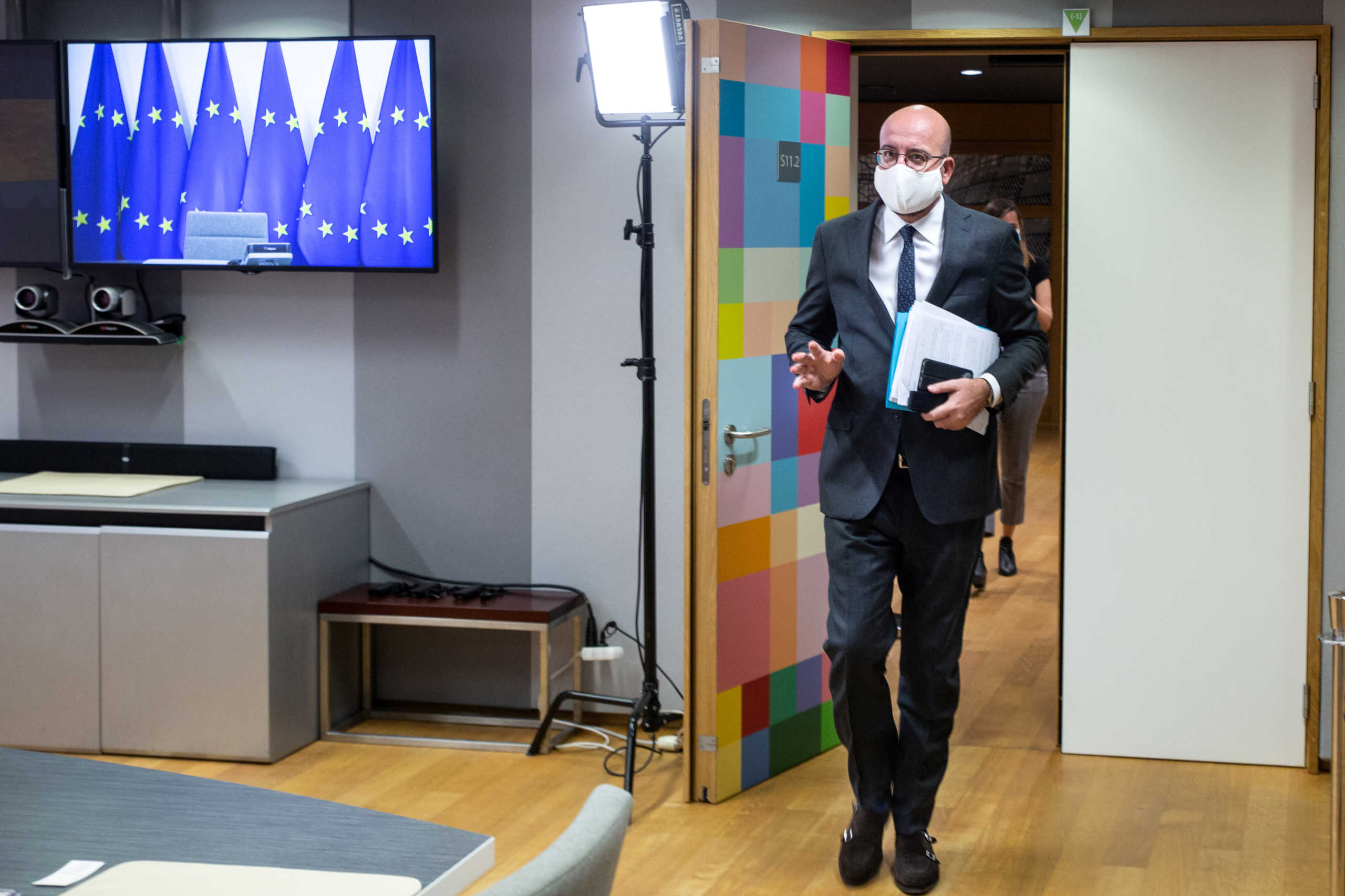 European Council President Charles Michel wearing a mask arrive to attend a video conference with German Chancellor Angela Merkel and Turkish President Tayyip Erdogan, at the European Council Headquarters in Brussels, Belgium September 22, 2020. Aris Oikonomou