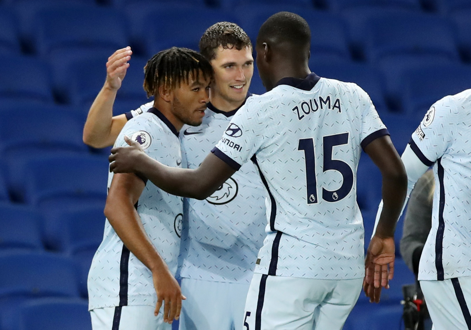 Soccer Football - Premier League - Brighton & Hove Albion v Chelsea - The American Express Community Stadium, Brighton, Britain - September 14, 2020. Chelsea's Reece James celebrates scoring their second goal with Andreas Christensen and Kurt Zouma. Pool via REUTERS