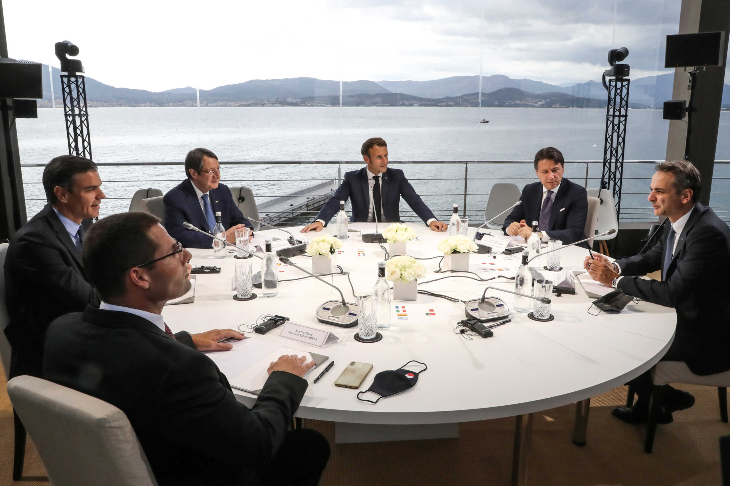 French President Emmanuel Macron opens the plenary session of the MED7 Mediterranean countries summit with Malta's Prime Minister Robert Abela, Spain's Prime Minister Pedro Sanchez, Cyprus President Nikos Anastasiadis, Italy's Prime Minister Giuseppe Conte and Greek Prime Minister Kyriakos Mitsotakis, in Porticcio, Corsica, France, September 10, 2020. Ludovic Marin