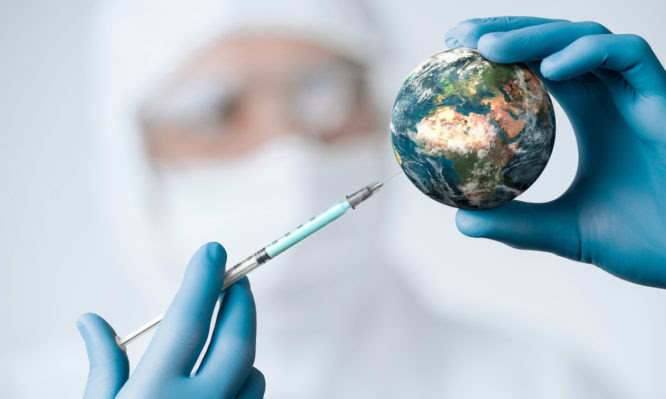 Pandemic concept, close up of scientist injecitng vaccine into the earth