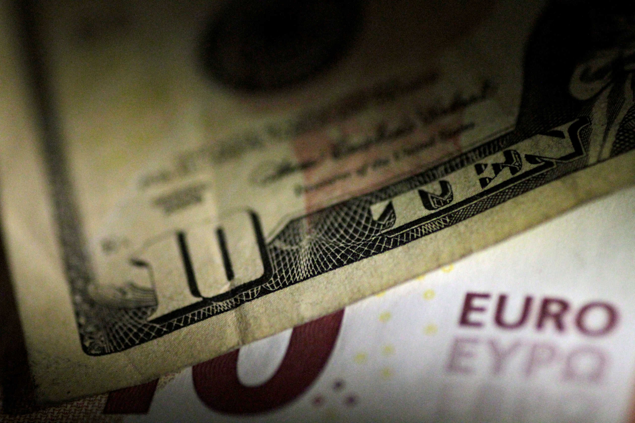FILE PHOTO: U.S. Dollar and Euro notes are seen in this June 22, 2017 illustration photo. REUTERS