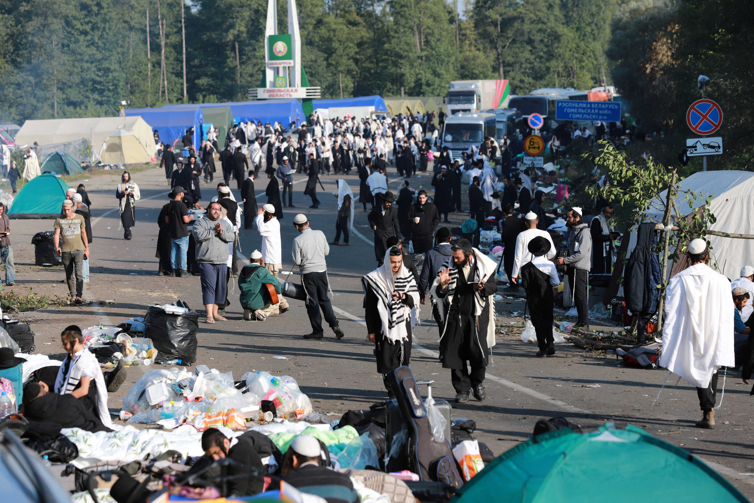 Jewish pilgrims, who planed to enter Ukraine for a pilgrimage from the territory of Belarus and stranded at a border crossing, are seen at Novi Yarylovychi crossing point in Chernihiv Region, Ukraine September 17, 2020.  State Border Guard Service of Ukraine