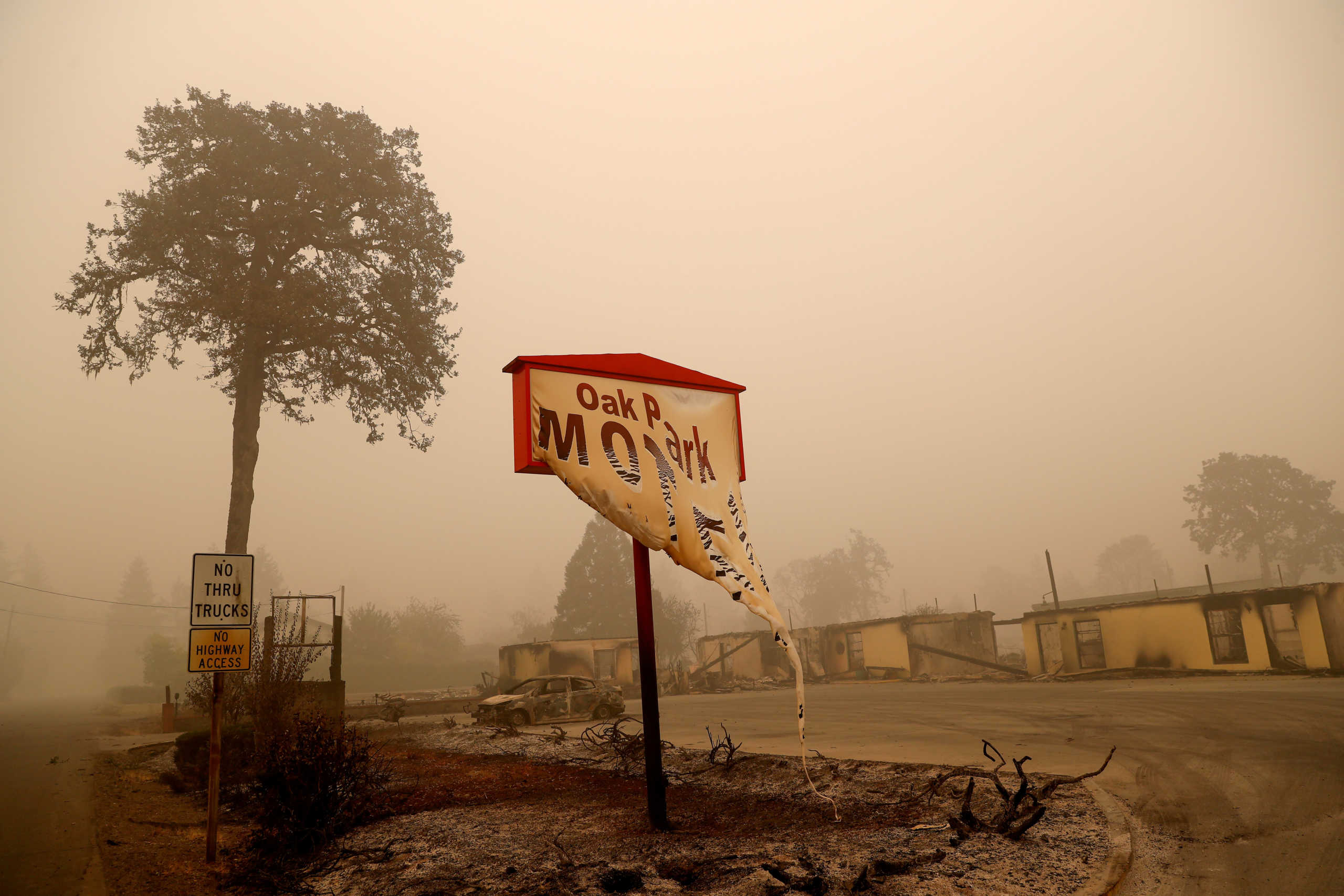 FILE PHOTO: The remains of a fire damaged hotel sit, in the aftermath of the Beachie Creek fire in Gates, Oregon, U.S., September 14, 2020. REUTERS