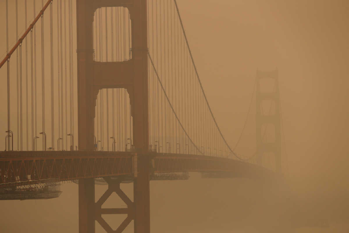 The Golden Gate Bridge is seen under a smoke filled sky from California wildfires in San Francisco, California, U.S., September 10, 2020. REUTERS