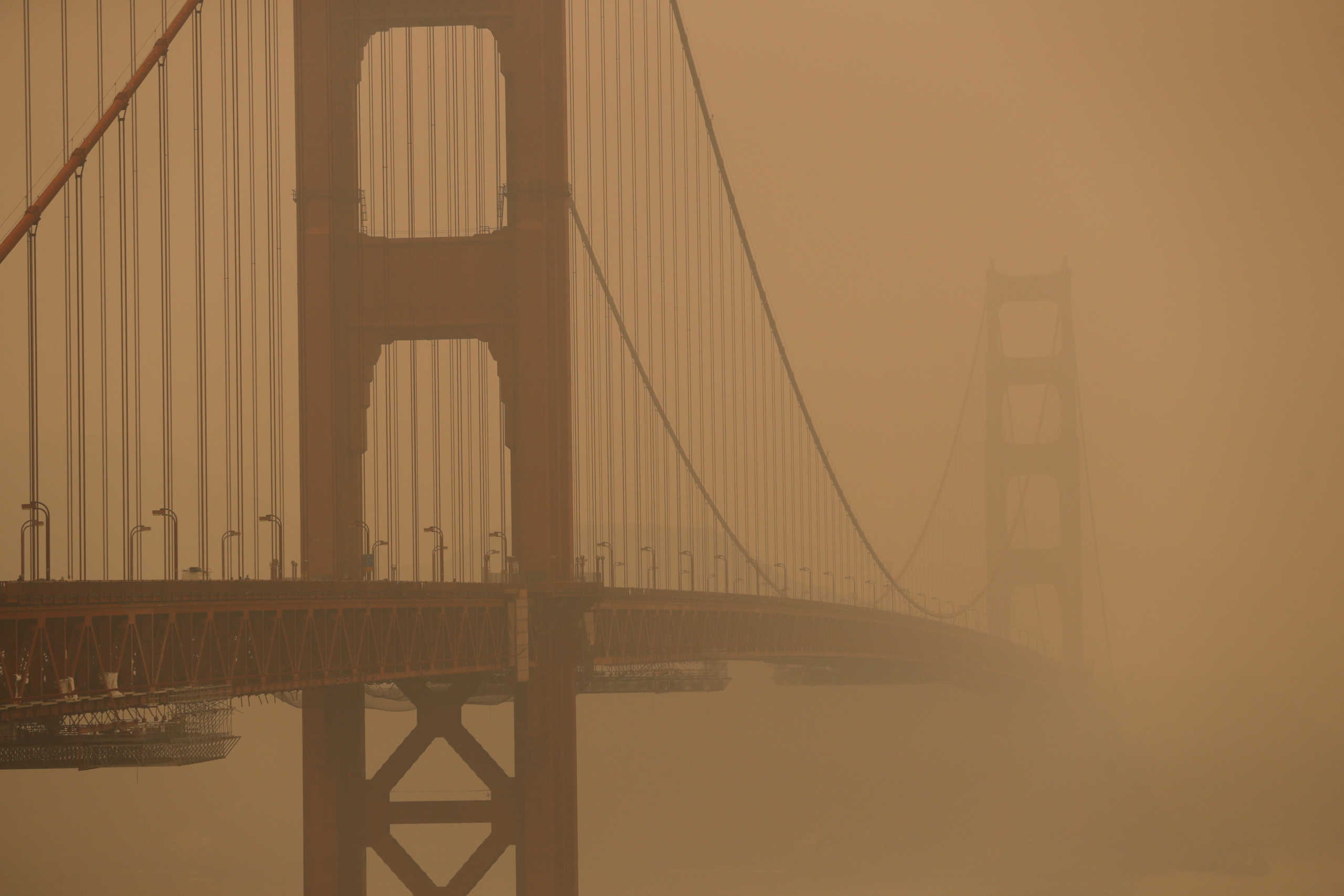 The Golden Gate Bridge is seen under a smoke filled sky from California wildfires in San Francisco, California, U.S., September 10, 2020. REUTERS
