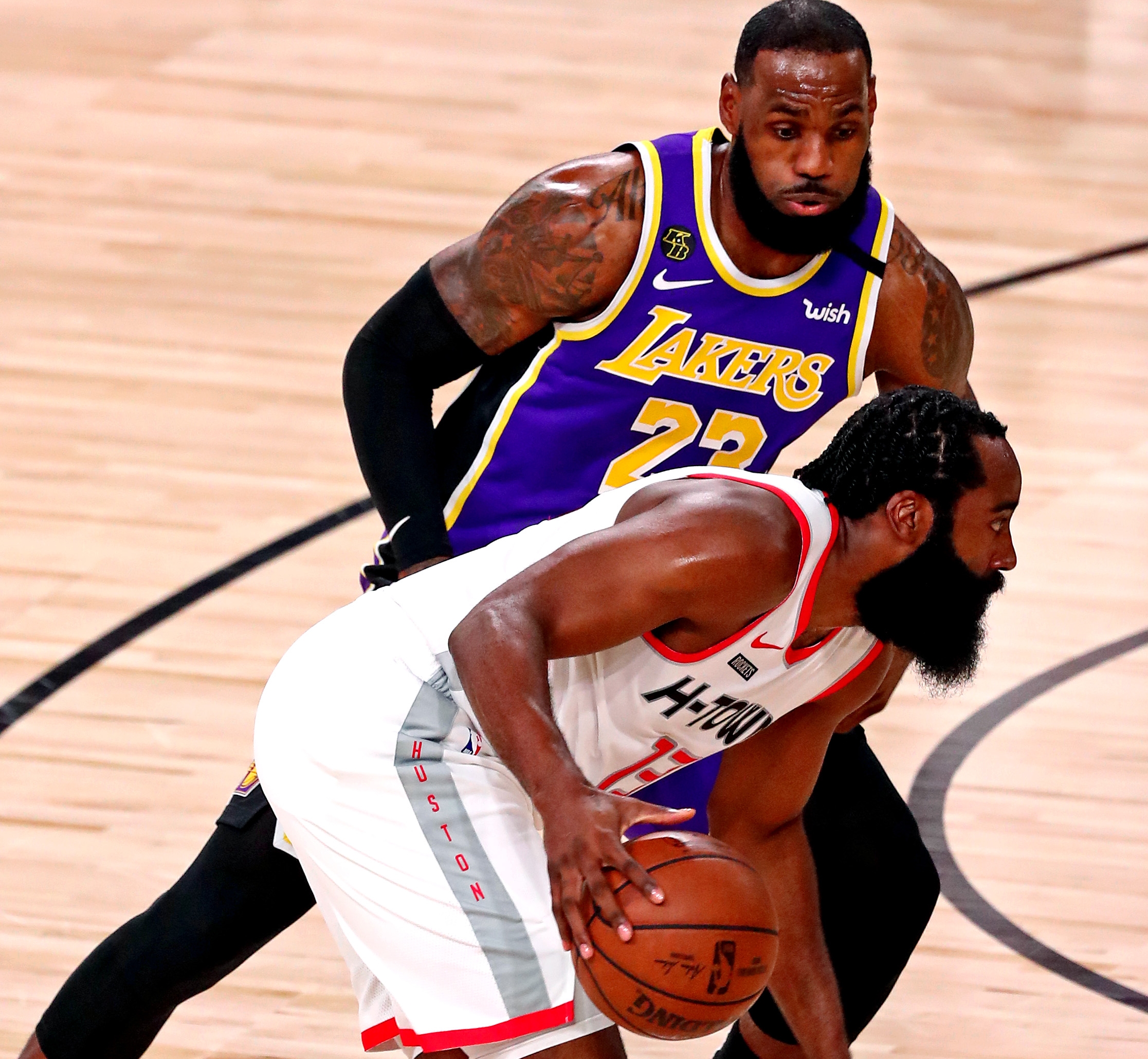 Sep 4, 2020; Lake Buena Vista, Florida, USA; Houston Rockets guard James Harden (13) drives to the basket against Los Angeles Lakers forward LeBron James (23) during the first quarter in game one of the second round of the 2020 NBA Playoffs at AdventHealth Arena. Mandatory Credit: Kim Klement-USA TODAY Sports