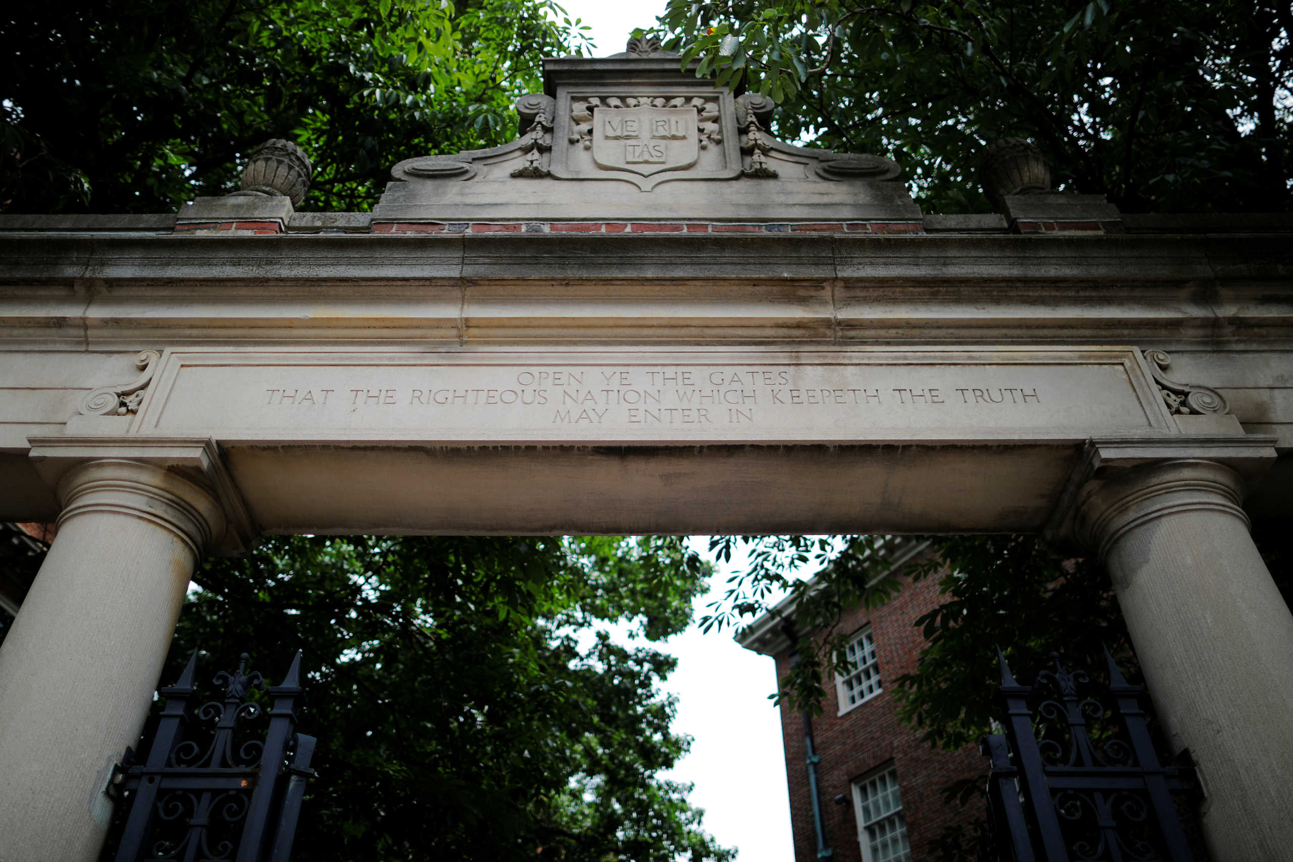 FILE PHOTO: One of the 25 gates to Harvard Yard is open at Harvard University in Cambridge, Massachusetts, U.S., June 18, 2018. REUTERS
