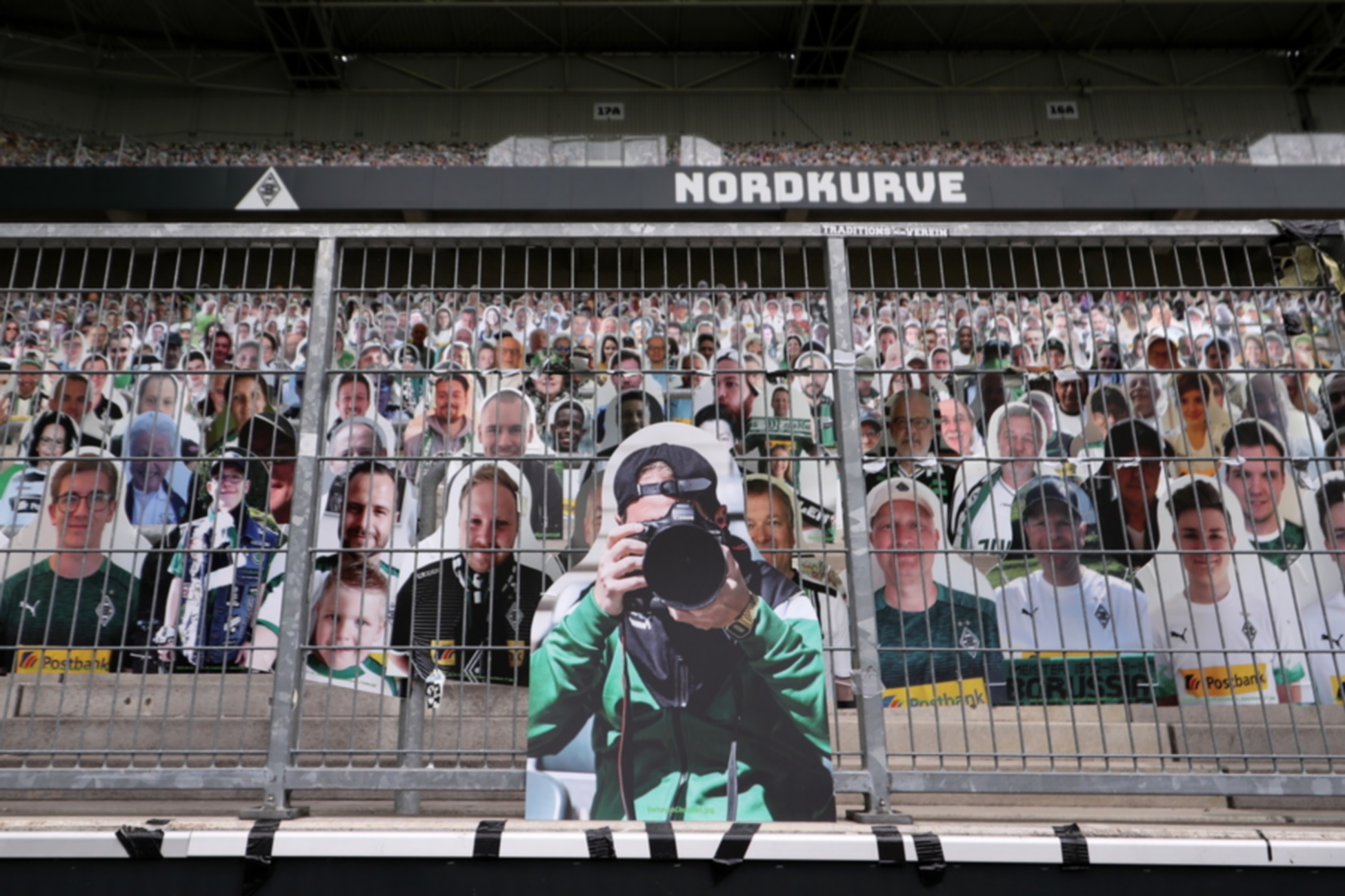 epa08512185 A cardboard cut-out of a photographer is seen  during the German Bundesliga soccer match between Borussia Moenchengladbach and Hertha BSC at Borussia-Park in Moenchengladbach, Germany, 27 June 2020.  EPA