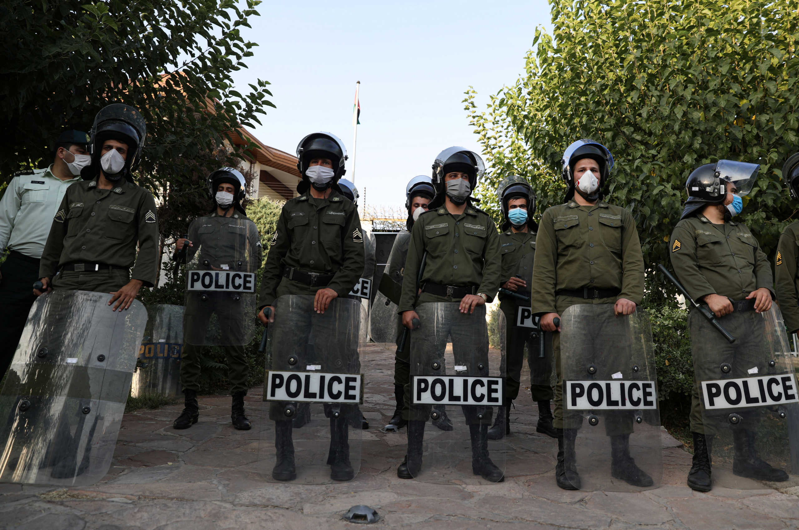 Police stand guard as students gather in front of the UAE Embassy to protest the normalization of relations with Israel, in Tehran, Iran August 15, 2020. Majid Asgarpour