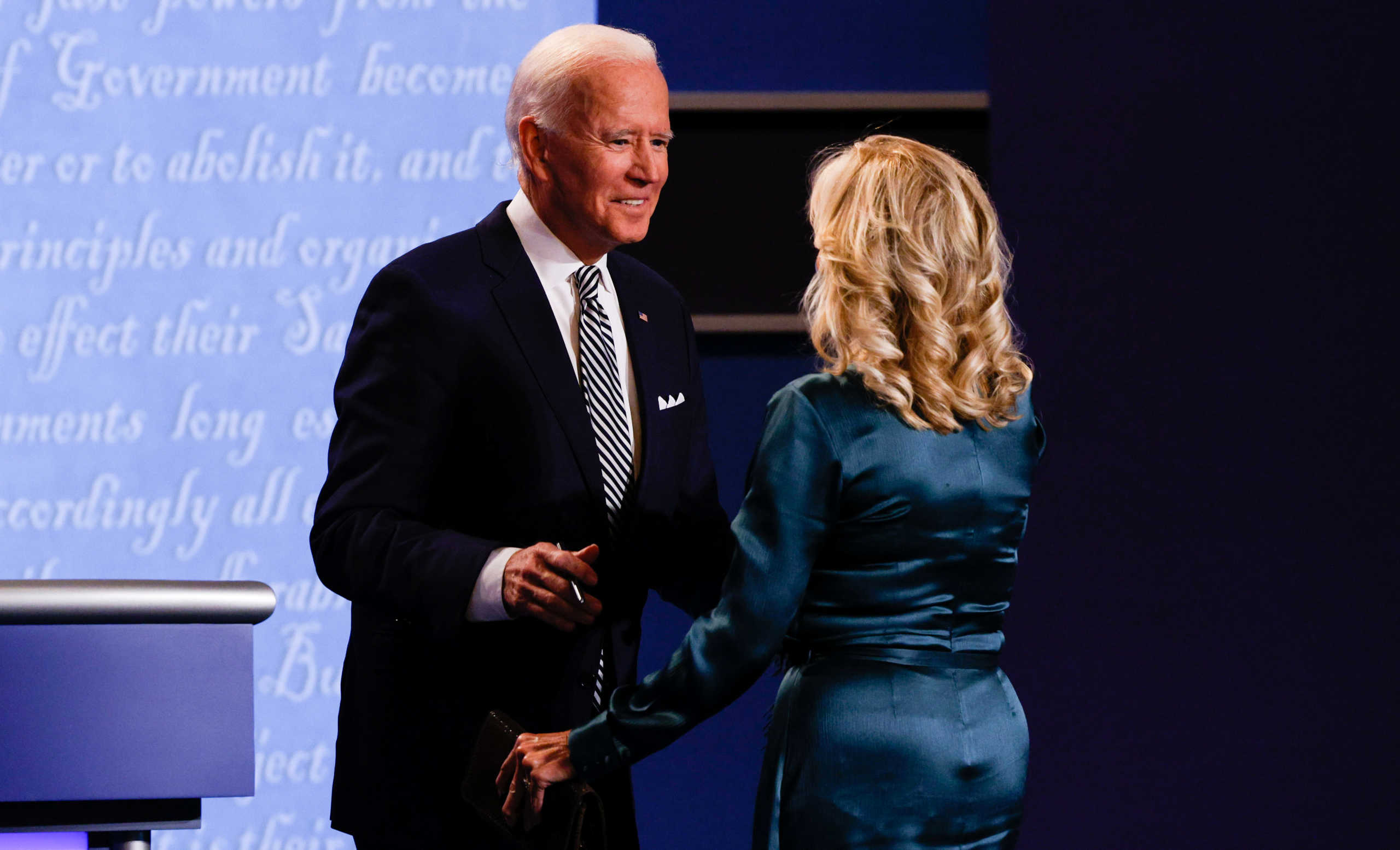 Democratic presidential nominee Joe Biden greets his wife Jill as she arrives onstage at the end of U.S. President Donald Trump and Democratic presidential nominee Joe Biden first 2020 presidential campaign debate held on the campus of the Cleveland Clinic at Case Western Reserve University in Cleveland, Ohio, U.S., September 29, 2020. REUTERS