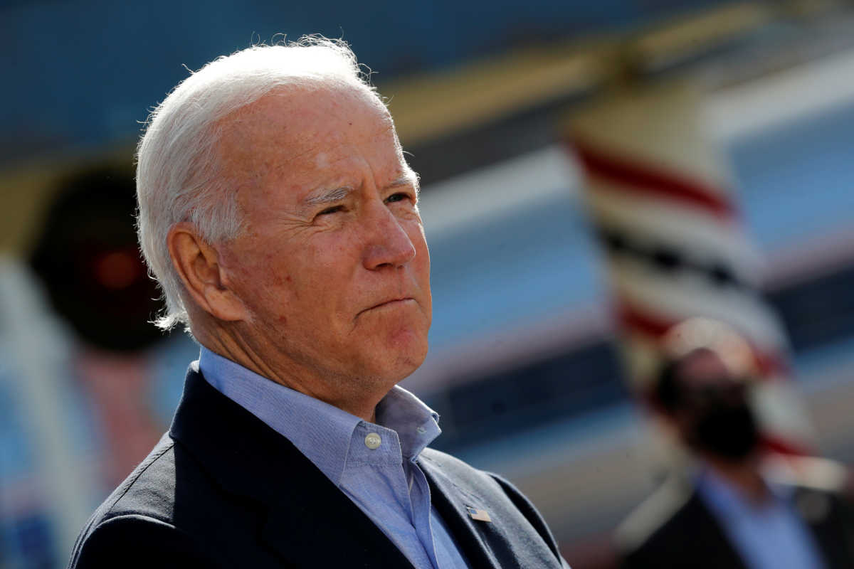U.S. Democratic presidential candidate and former Vice President Joe Biden makes remarks as he prepares to board an Amtrak train to begin a campaign train tour in Cleveland, Ohio, U.S., September 30, 2020. REUTERS