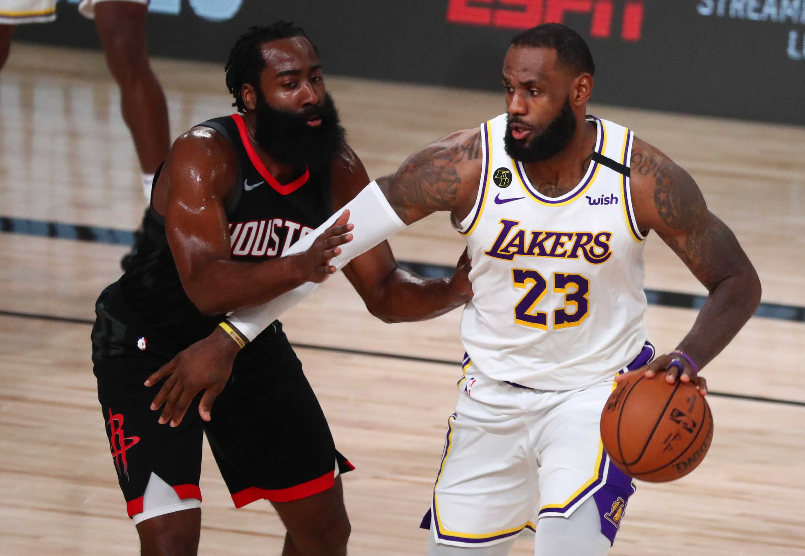 Sep 12, 2020; Lake Buena Vista, Florida, USA; Los Angeles Lakers forward LeBron James (23) dribbles the ball around Houston Rockets guard James Harden (13) in the first half of game five of the second round of the 2020 NBA Playoffs at ESPN Wide World of Sports Complex. Mandatory Credit: Kim Klement-USA TODAY Sports