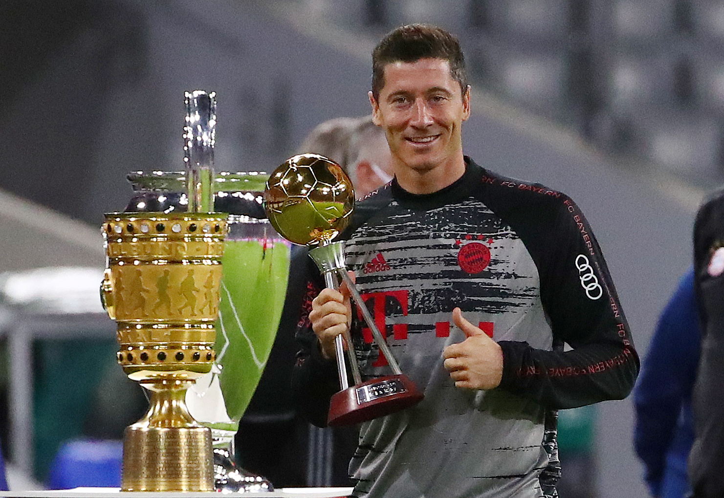 Soccer Football - Bundesliga - Bayern Munich v Schalke 04 - Allianz Arena, Munich, Germany - September 18, 2020   Bayern Munich's Robert Lewandowski poses with trophies before the match   REUTERS