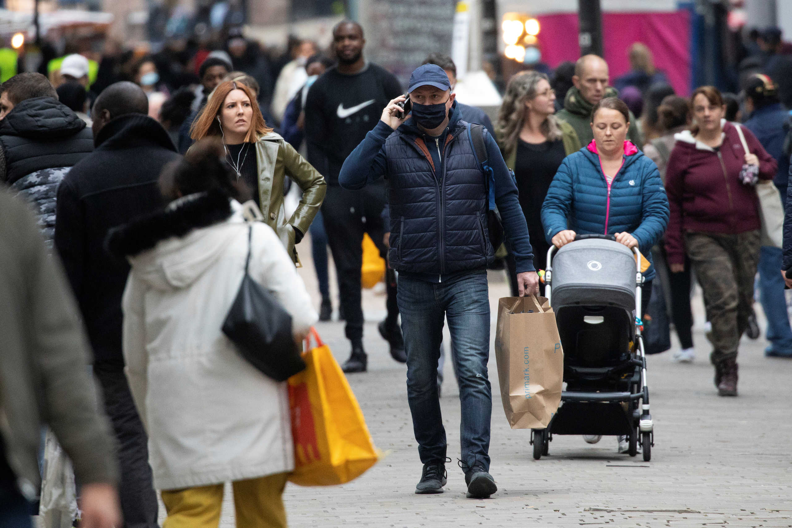 Pedestrians walk on the High Street, amid the spread of the coronavirus disease (COVID-19), in Croydon, south London, Britain, September 27, 2020. REUTERS