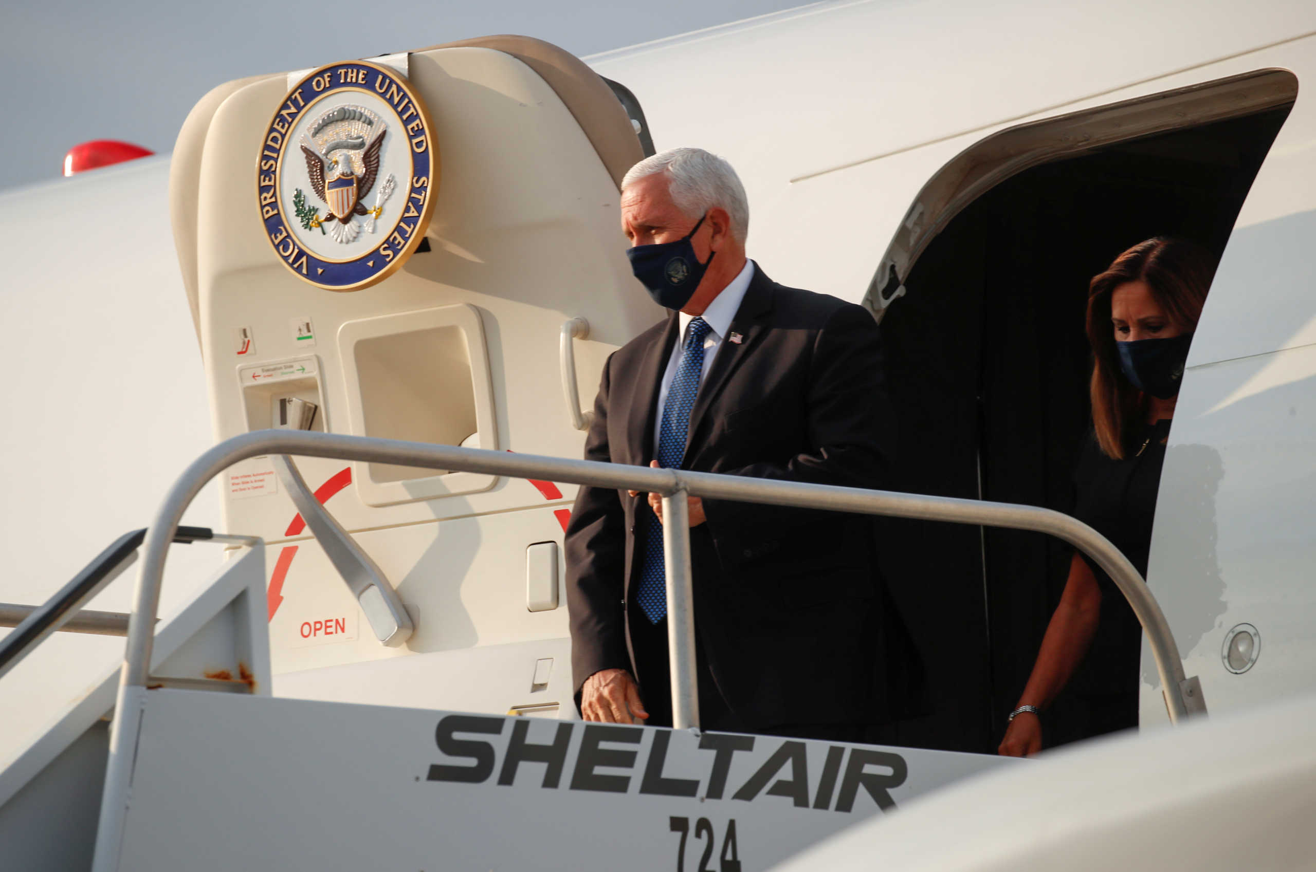 U.S. Vice President Mike Pence arrives at LaGuardia airport with his wife Karen on their way to attend ceremonies marking the 19th anniversary of the September 11, 2001 attacks on the World Trade Center at the 911 Memorial & Museum in New York City, New York, U.S., September 11, 2020. REUTERS