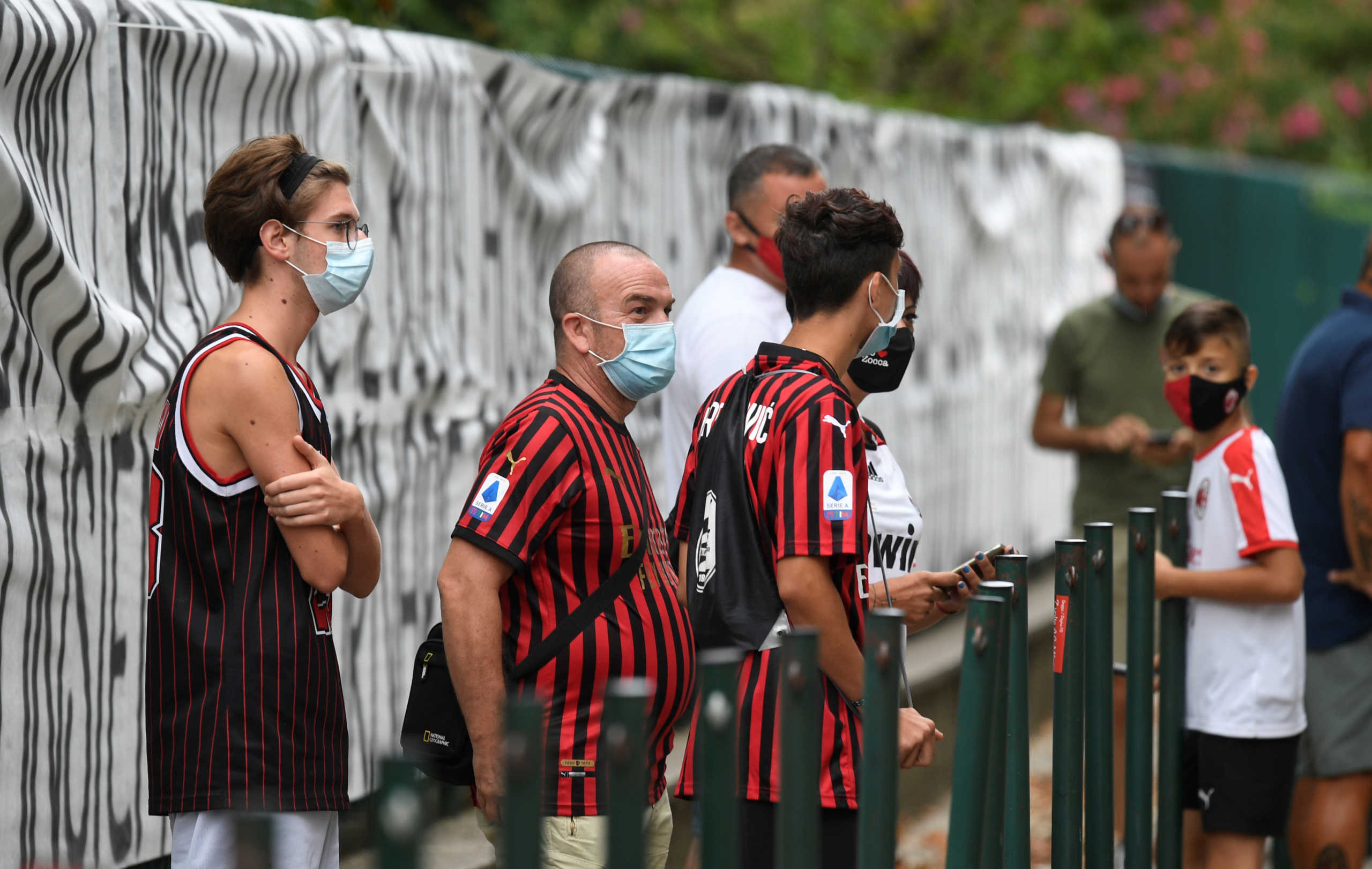 Soccer Football - AC Milan Training - Milan, Italy - August 24, 2020   AC Milan fans wait for players to arrive for training   REUTERS