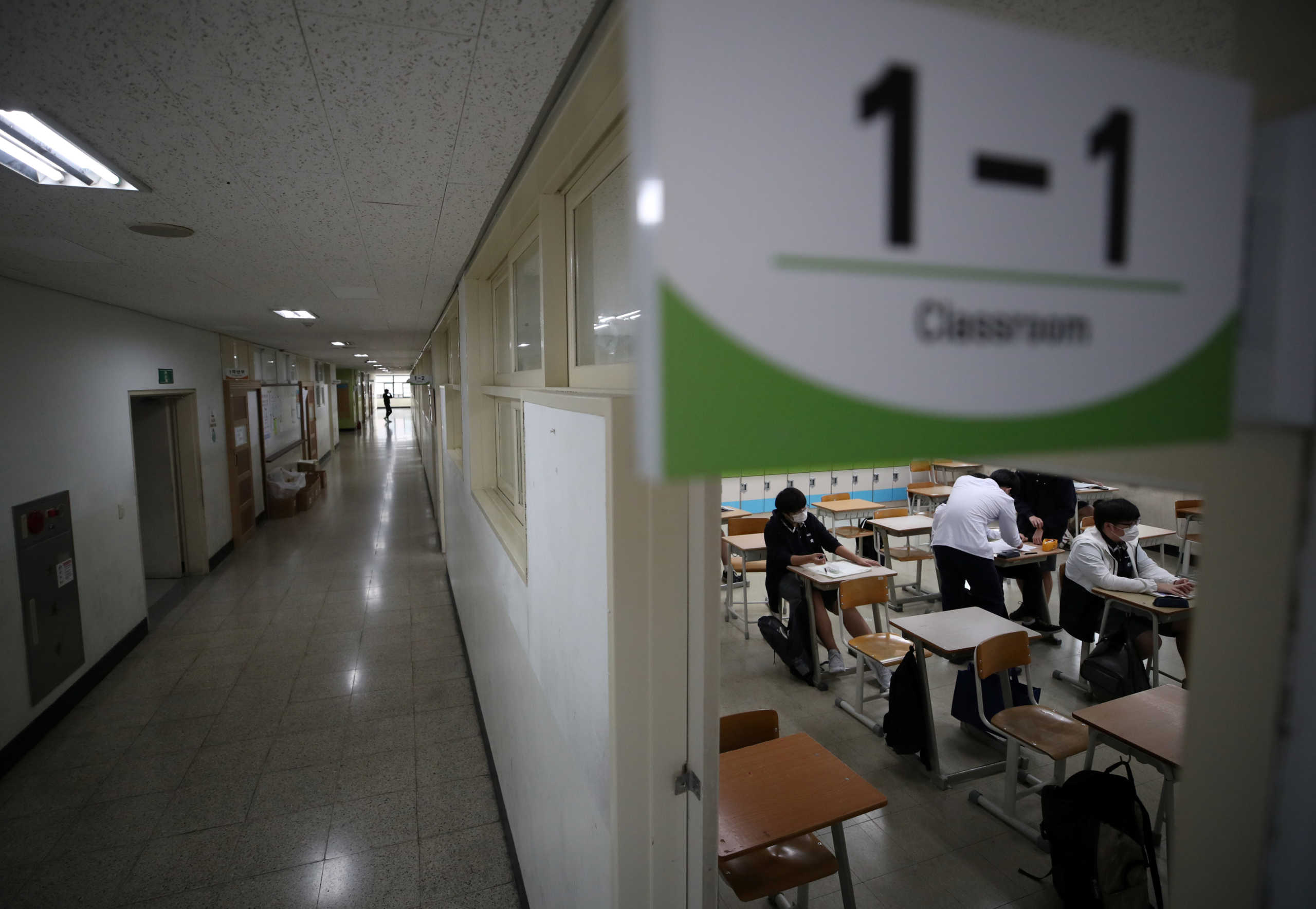 High school students prepare for a class amid the coronavirus disease (COVID-19) pandemic at a high school in Seoul, South Korea, September 21, 2020.   Yonhap via REUTERS   ATTENTION EDITORS - THIS IMAGE HAS BEEN SUPPLIED BY A THIRD PARTY. SOUTH KOREA OUT. NO RESALES. NO ARCHIVE.