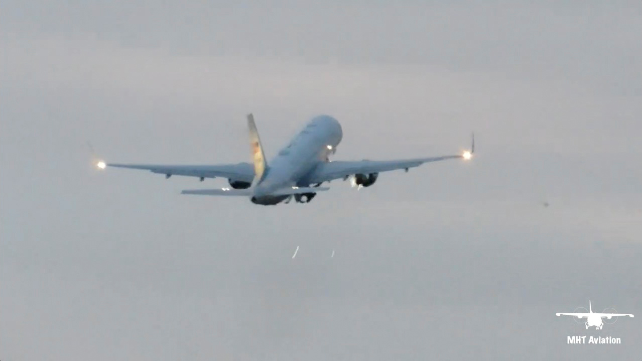 Sparks appear near the engine of Air Force 2, which carried U.S. Vice President Mike Pence, as the plane strikes a bird during takeoff at Manchester, New Hampshire, September 22, 2020, in this still image from video obtained via social media.  MHT Aviation via REUTERS     ATTENTION EDITORS - THIS IMAGE HAS BEEN SUPPLIED BY A THIRD PARTY. MANDATORY CREDIT. NO RESALES. NO ARCHIVES.