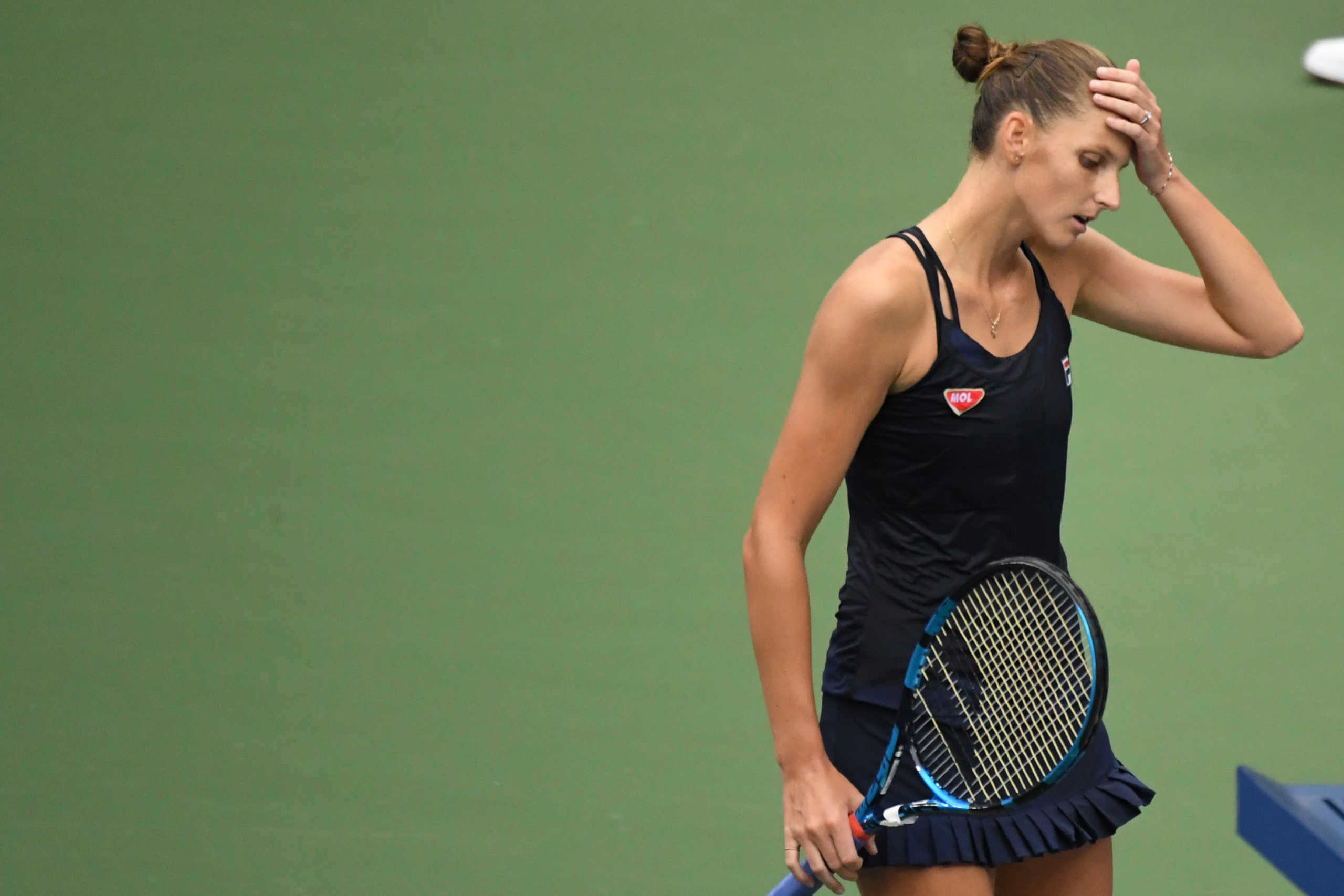 Sep 2, 2020; Flushing Meadows, New York, USA; Karolina Pliskova of Czech Republic reacts while walking to her playerÕs chair for a changeover after losing a game against Caroline Garcia of France (not pictured) on day three of the 2020 U.S. Open tennis tournament at USTA Billie Jean King National Tennis Center. Mandatory Credit: Danielle Parhizkaran-USA TODAY Sports