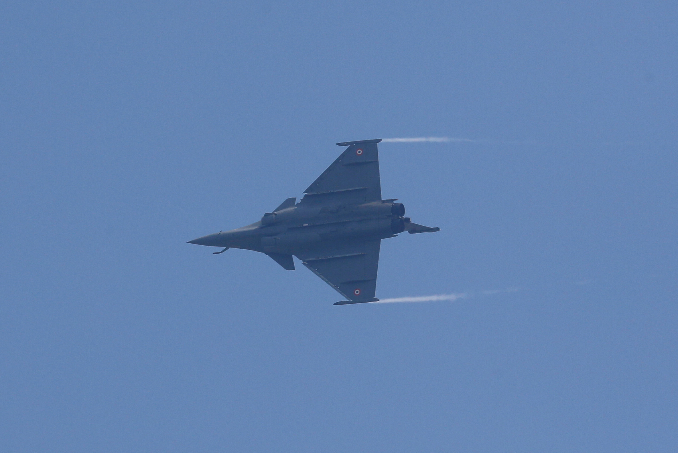 A Rafale fighter jet flies during its induction ceremony at an air force station in Ambala, India, September 10, 2020. REUTERS