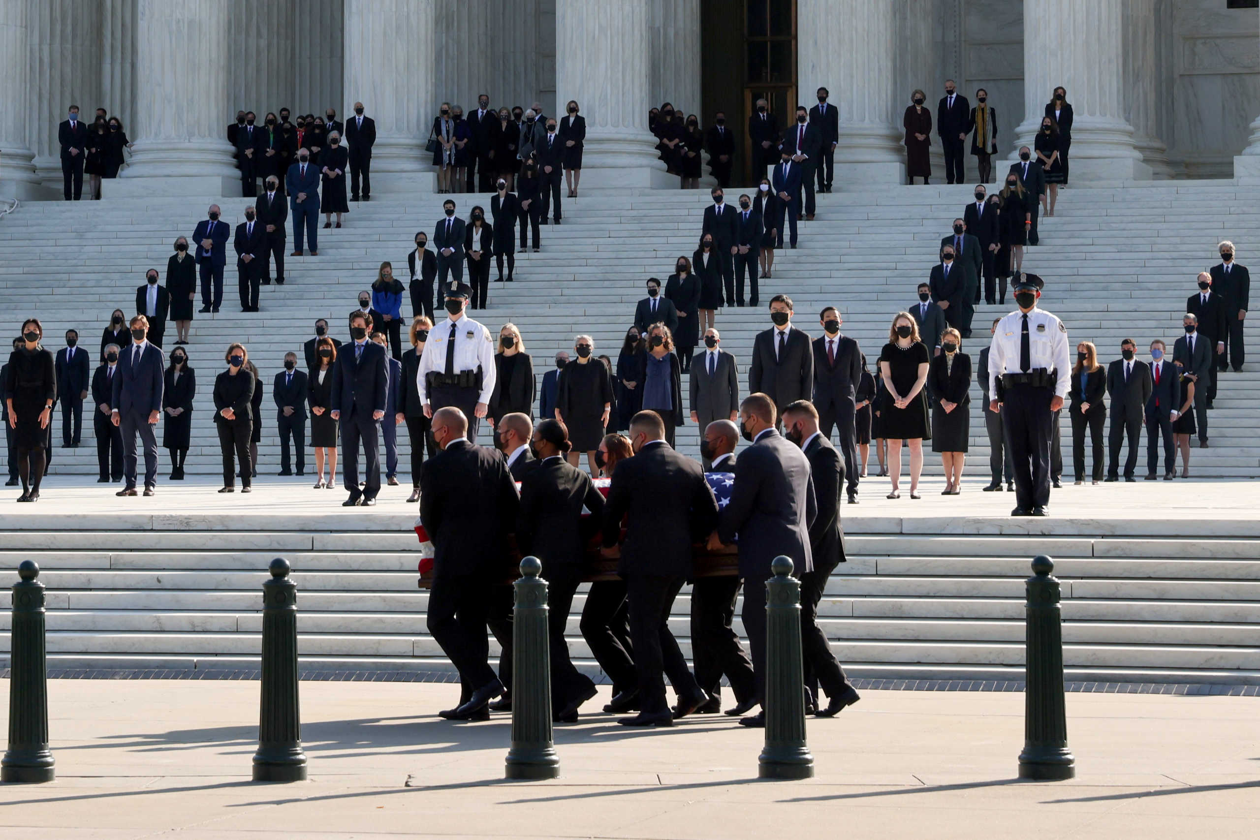 The casket of the late Supreme Court Associate Justice Ruth Bader Ginsburg is carried at the U.S. Supreme Court, where it will lie in repose in Washington, U.S., September 23, 2020. REUTERS