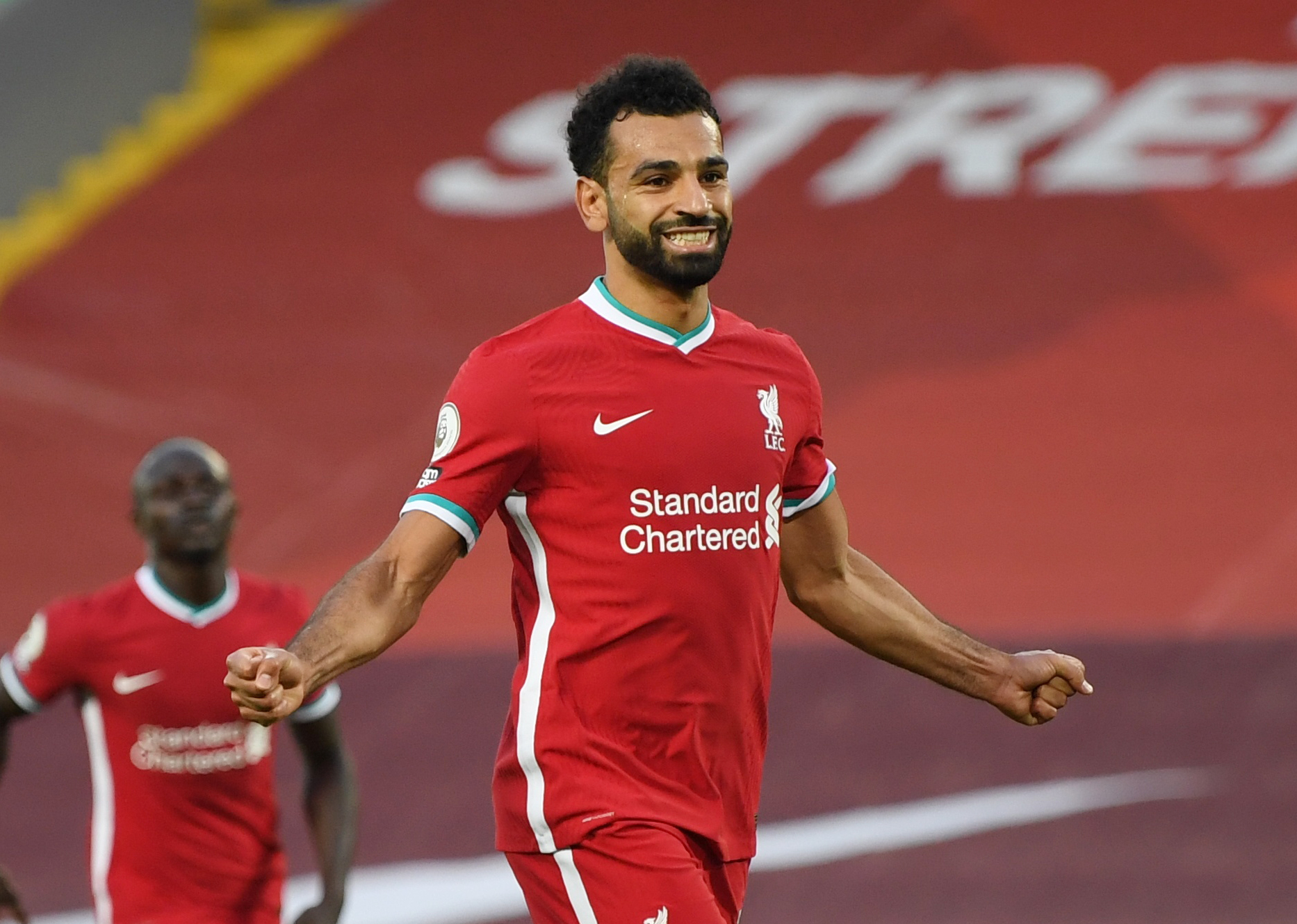 Soccer Football - Premier League - Liverpool v Leeds United - Anfield, Liverpool, Britain - September 12, 2020 Liverpool's Mohamed Salah celebrates scoring their fourth goal to complete his hat-trick. Pool via REUTERS