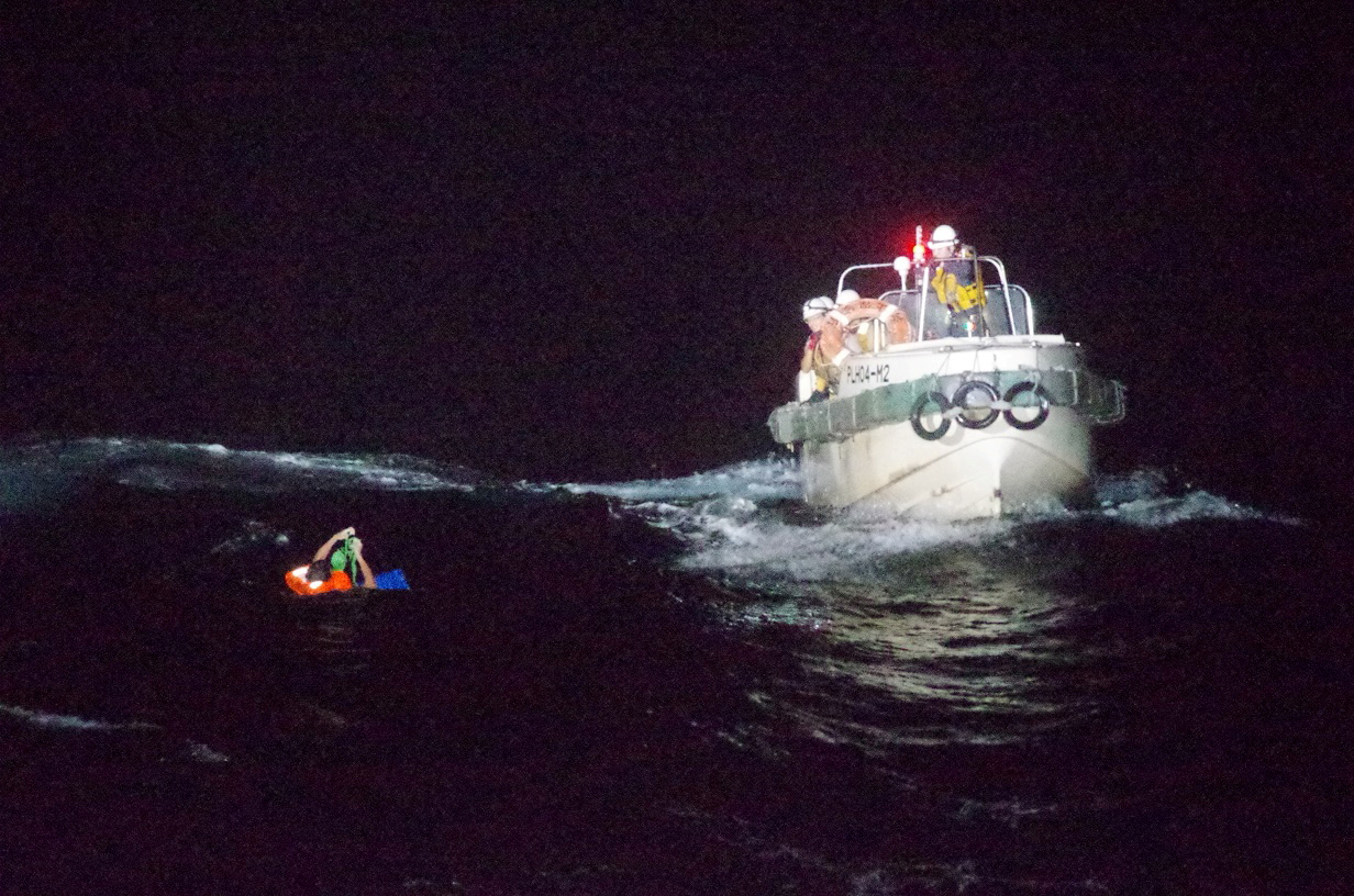 A Filipino crew member believed to be onboard Gulf Livestock 1, a cargo ship carrying livestock and dozens of crew members that went missing after issuing a distress signal due to Typhoon Maysak, is rescued by a Japan Coast Guard boat during their search and rescue operation at the East China Sea, to the west of Amami Oshima island in southwestern Japan, in this handout photo taken on September 2, 2020 and provided by Japan Coast Guard. Picture taken September 2, 2020. 10th Regional Coast Guard Headquarters - Japan Coast Guard