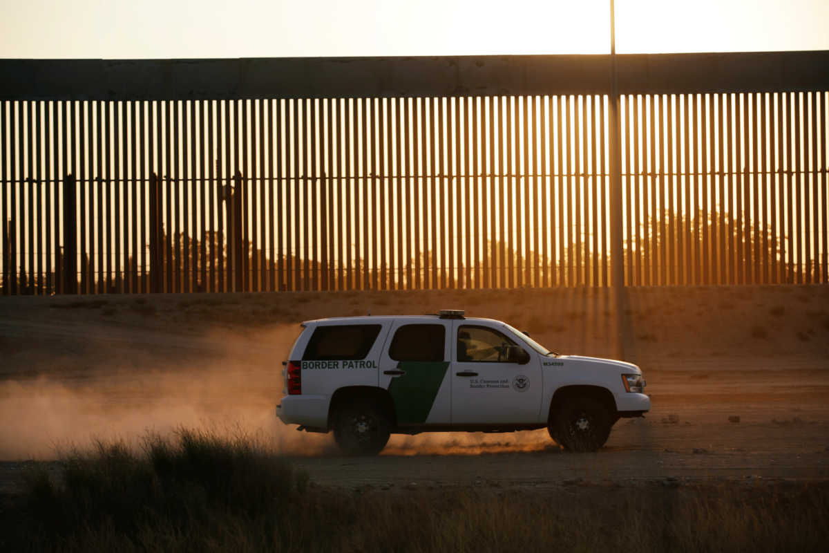 A vehicle of U.S. Customs and Border Protection (CBP) patrols along a new section of the border wall in El Paso, Texas, U.S., as seen from Ciudad Juarez, Mexico August 27, 2020. REUTERS