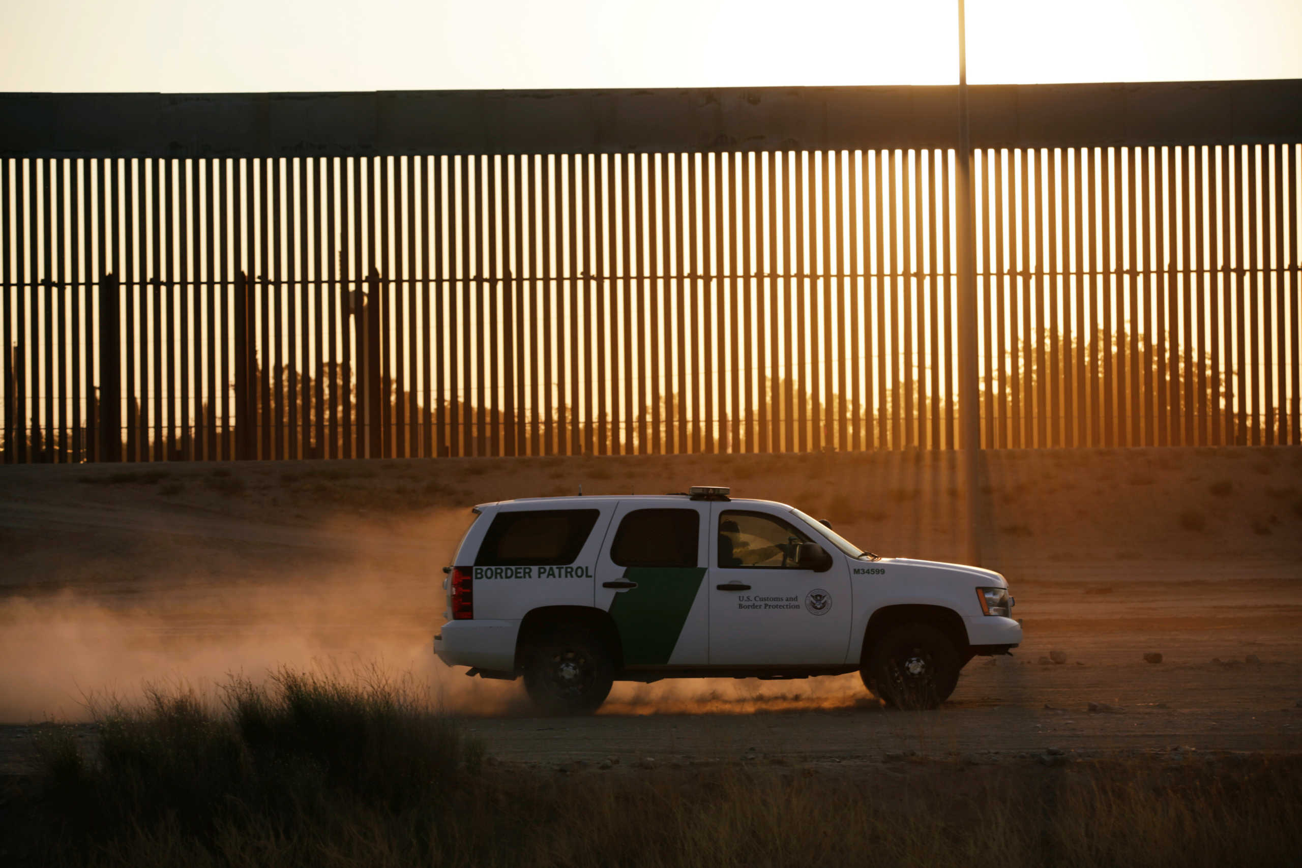 A vehicle of U.S. Customs and Border Protection (CBP) patrols along a new section of the border wall in El Paso, Texas, U.S., as seen from Ciudad Juarez, Mexico August 27, 2020. REUTERS