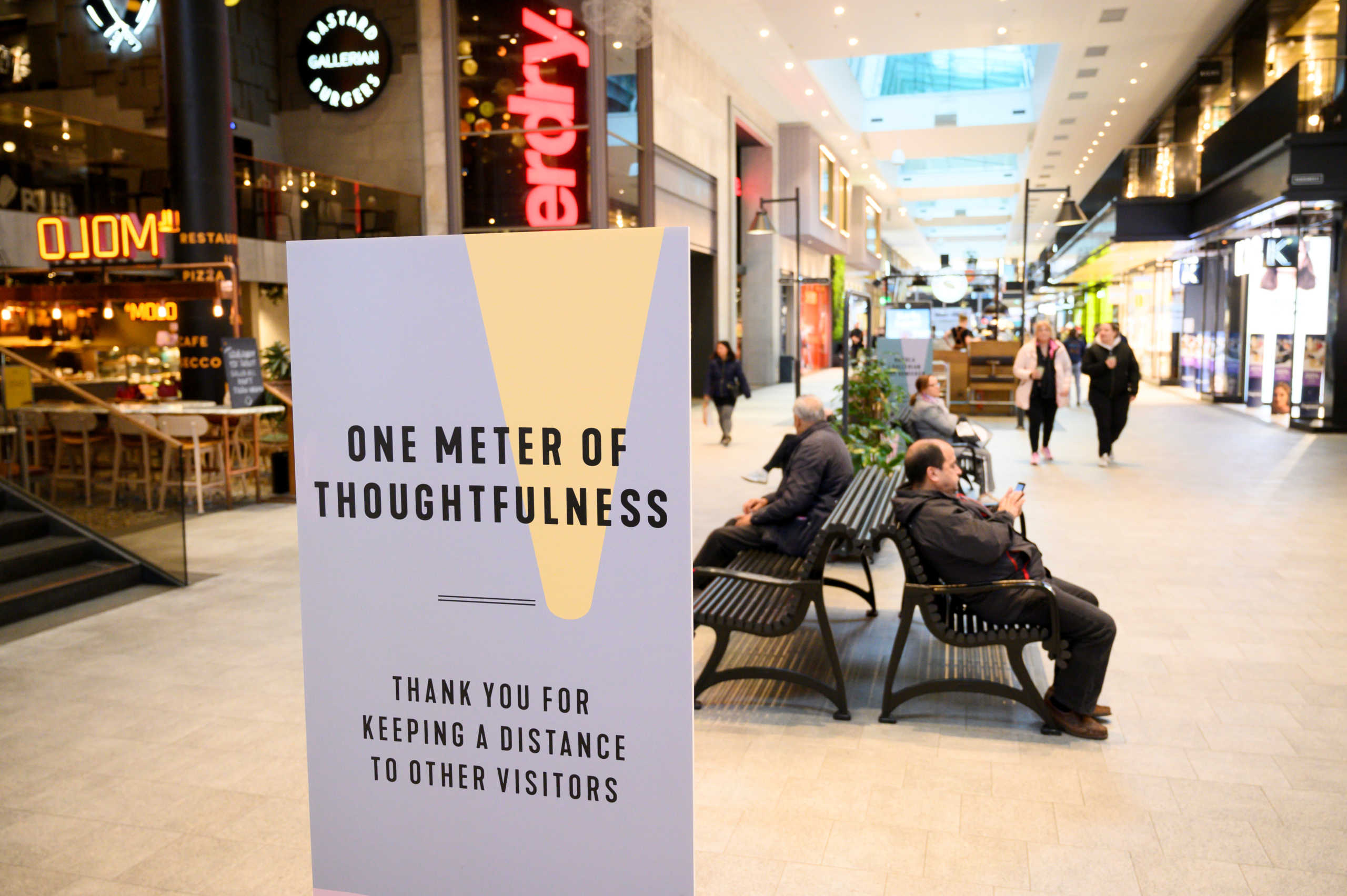 FILE PHOTO: A sign promoting social distancing is pictured in the Gallerian shopping center, as the spread of the coronavirus disease (COVID-19) continues, in Stockholm, Sweden, May 12, 2020. TT News Agency