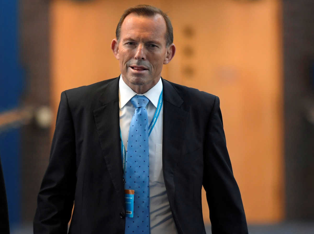 FILE PHOTO: Australia's former Prime Minister Tony Abbott attends Britain's annual Conservative Party Conference in Birmingham, Britain, October 5, 2016. REUTERS