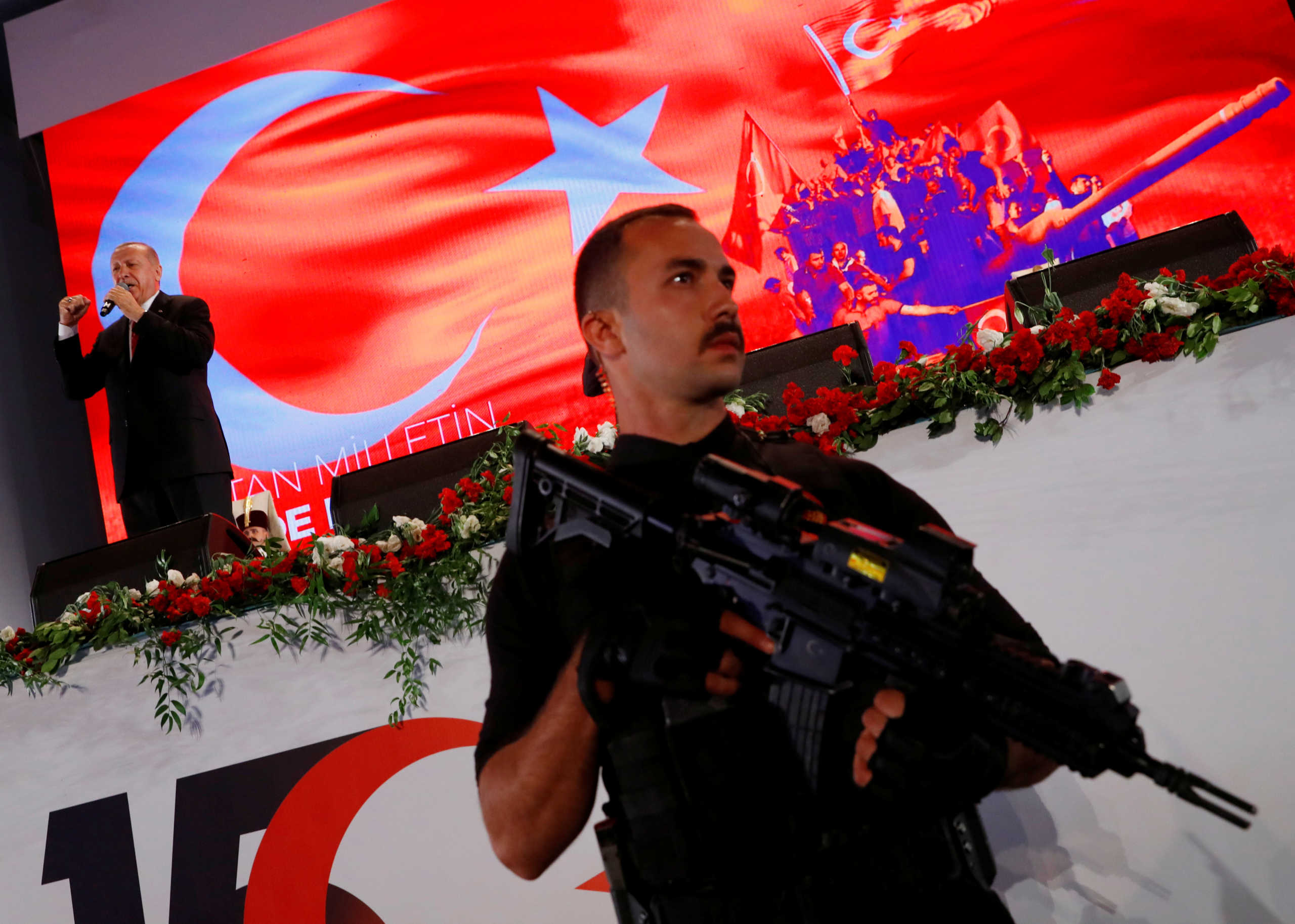 Turkish President Tayyip Erdogan addresses his supporters during a ceremony marking the third anniversary of the attempted coup at Ataturk Airport in Istanbul, Turkey, July 15, 2019. REUTERS