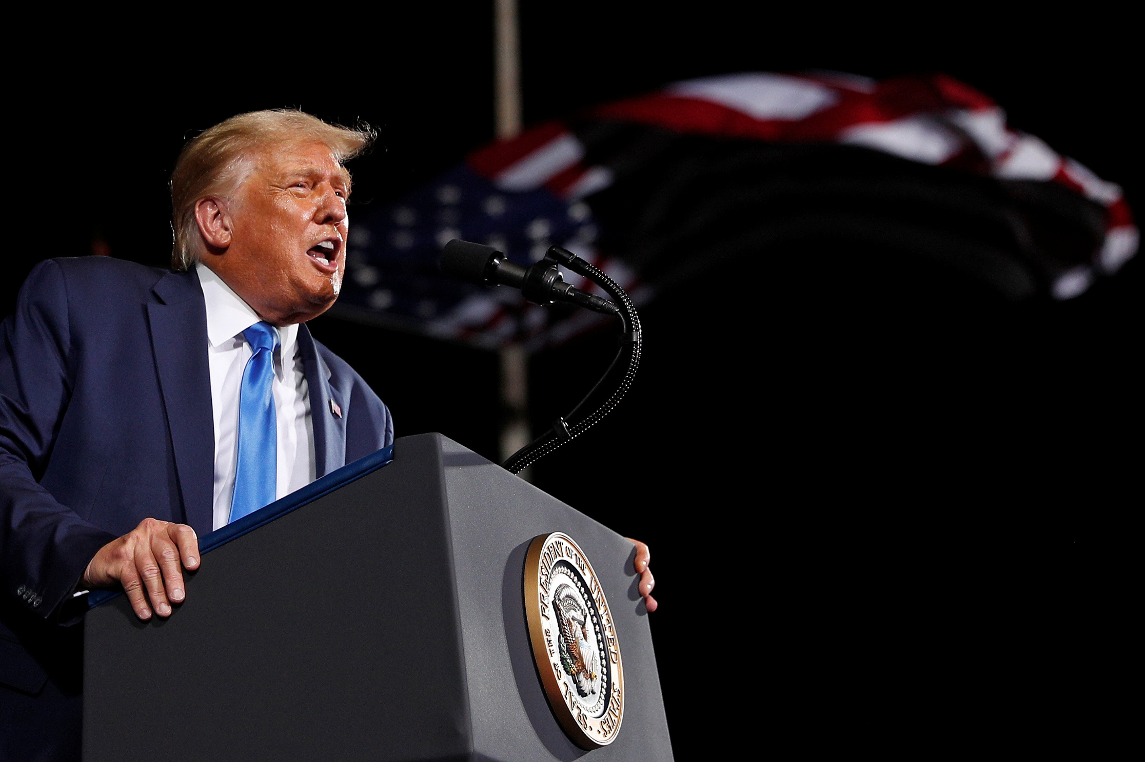 U.S. President Donald Trump speaks during a campaign rally at Cecil Airport in Jacksonville, Florida, U.S., September 24, 2020. REUTERS