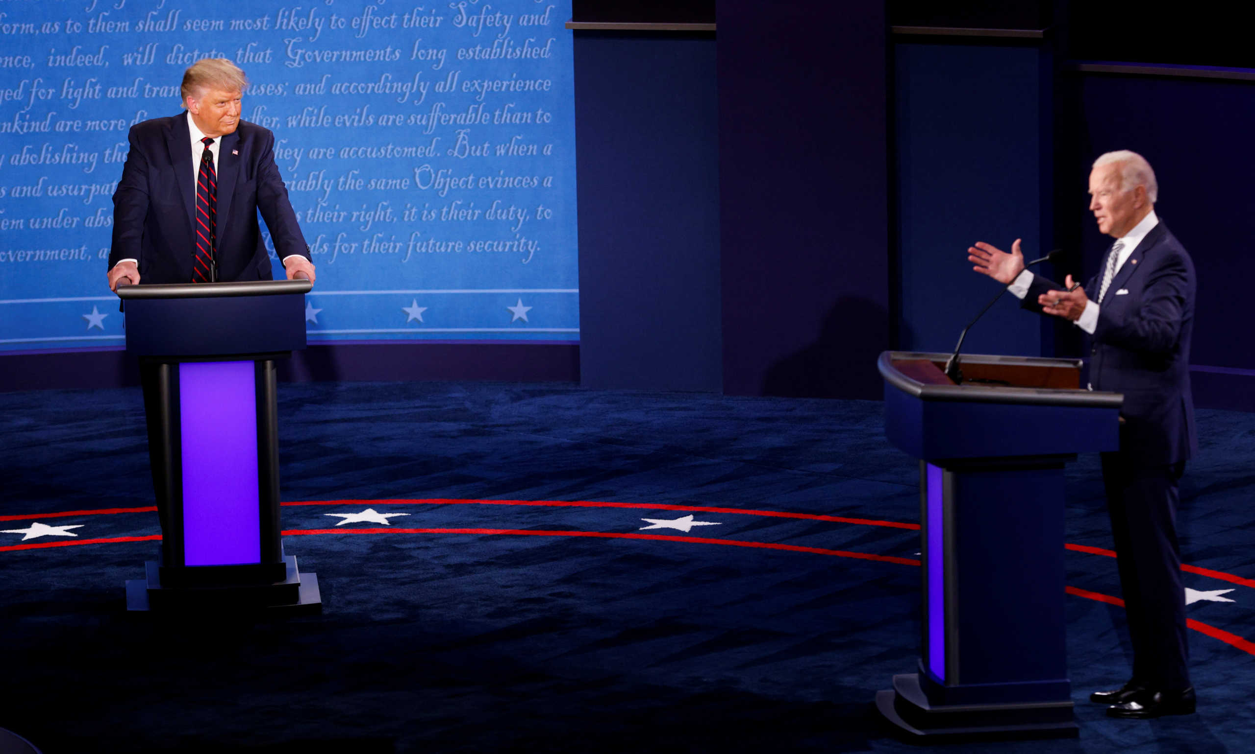 U.S. President Donald Trump and Democratic presidential nominee Joe Biden participate in their first 2020 presidential campaign debate held on the campus of the Cleveland Clinic at Case Western Reserve University in Cleveland, Ohio, U.S., September 29, 2020. REUTERS