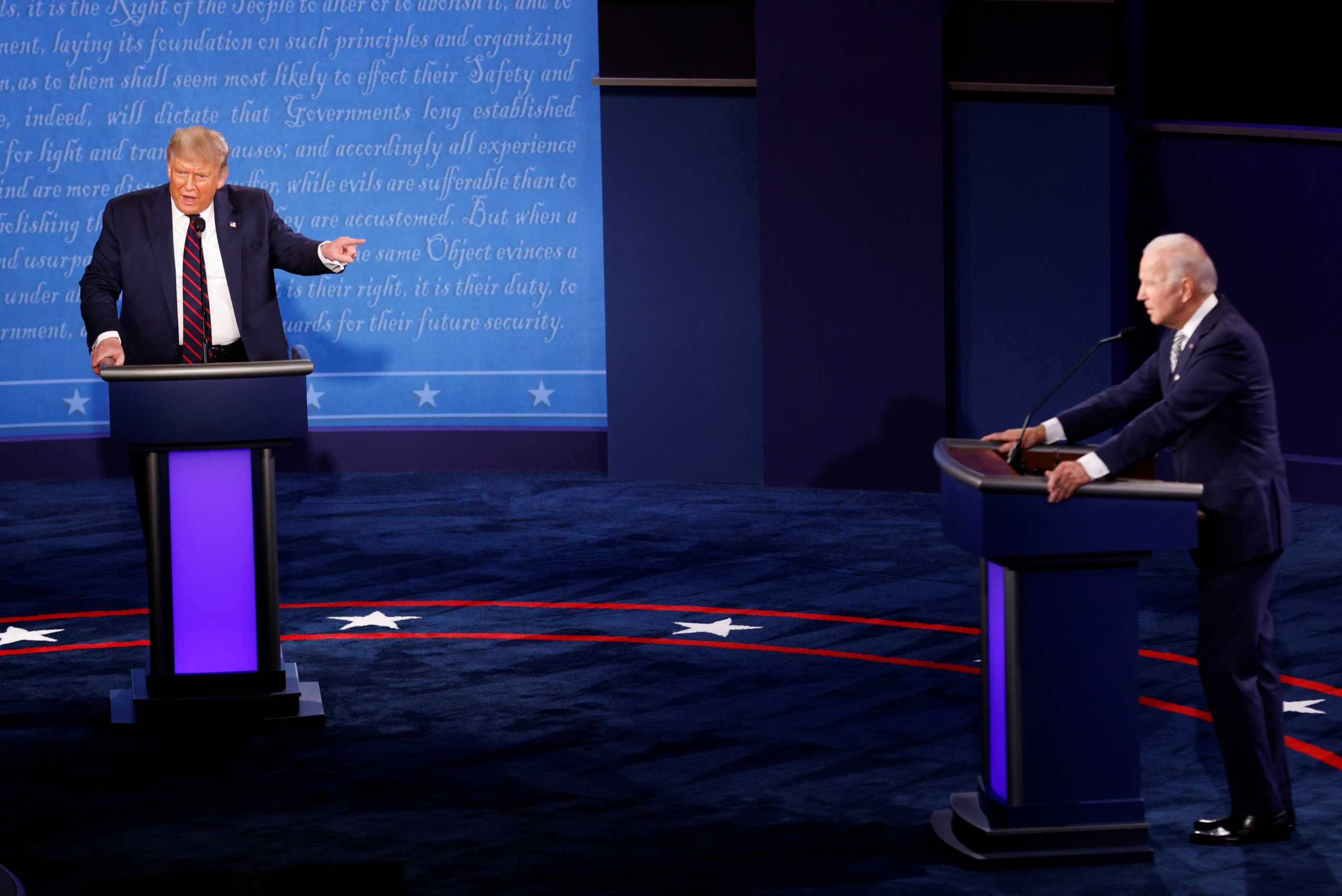 U.S. President Donald Trump and Democratic presidential nominee Joe Biden participate in their first 2020 presidential campaign debate held on the campus of the Cleveland Clinic at Case Western Reserve University in Cleveland, Ohio, U.S., September 29, 2020. REUTERS