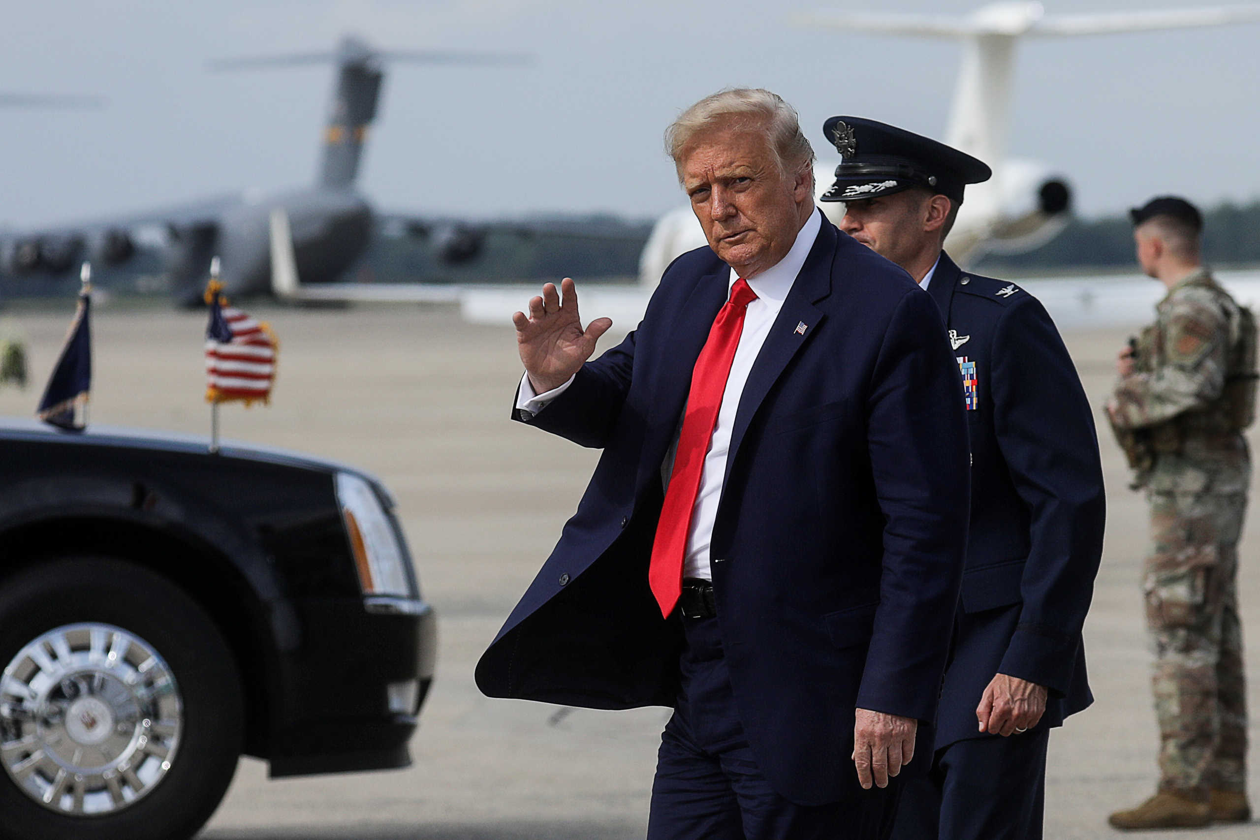 U.S. President Donald Trump waves after returning to Washington from travel to Wilmington, North Carolina at Joint Base Andrews, Maryland, U.S., September 2, 2020. REUTERS