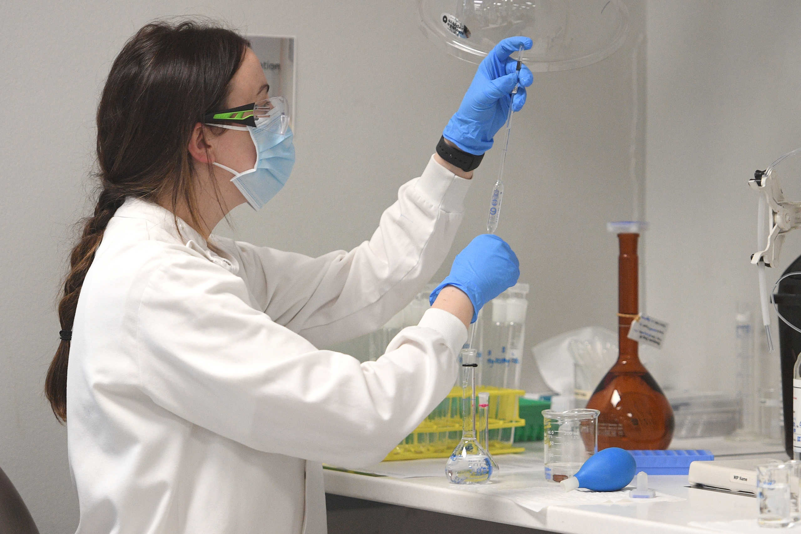 A chemist works at AstraZeneca's headquarters, after Prime Minister Scott Morrison announced Australians will be among the first in the world to receive a coronavirus disease (COVID-19) vaccine, if it proves successful, through an agreement between the government and UK-based drug company AstraZeneca, in Sydney, Australia, August 19, 2020.  AAP Image