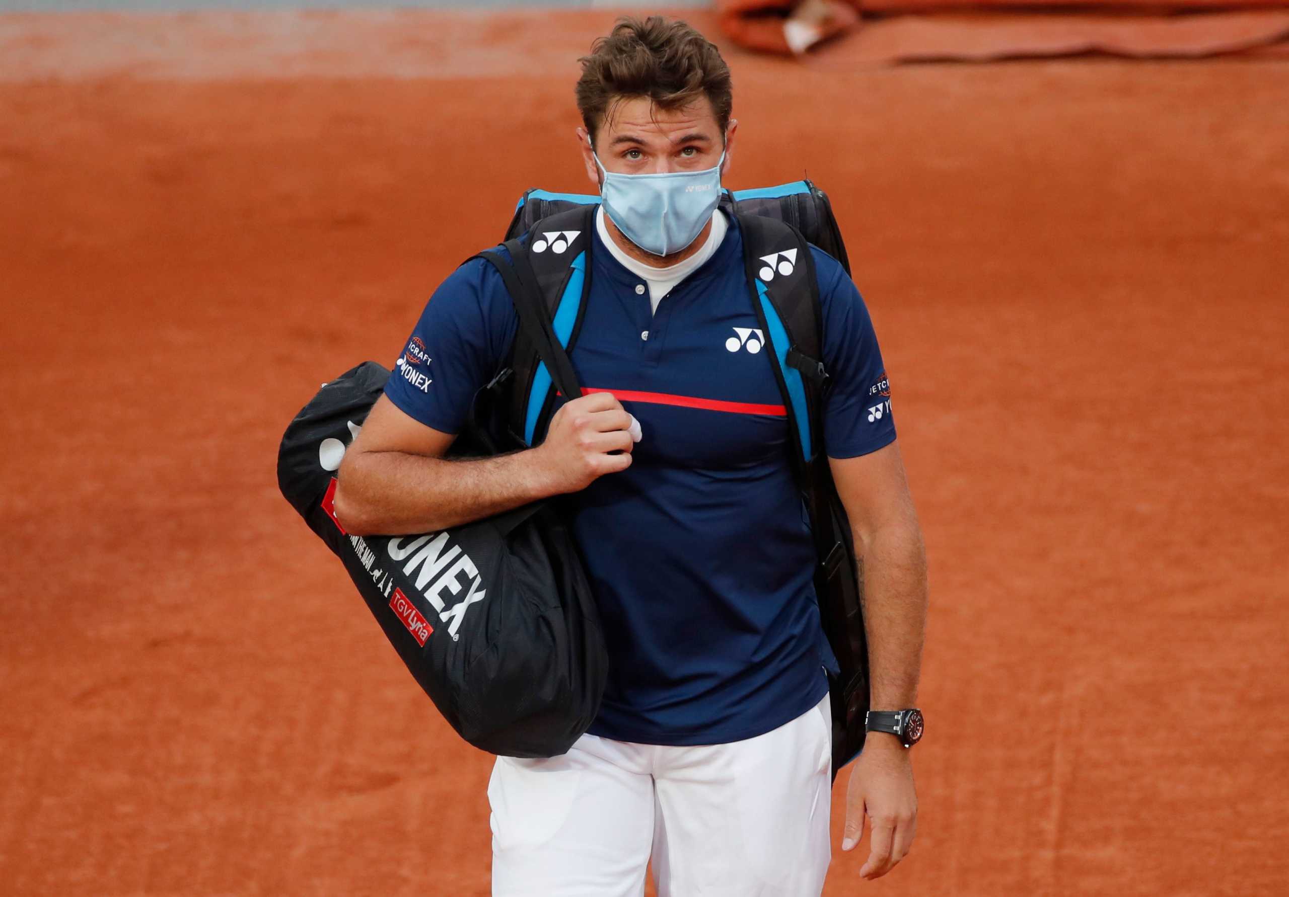 Tennis - French Open - Roland Garros, Paris, France - September 27, 2020. Switzerland's Stan Wawrinka walks out before his first round match against Britain's Andy Murray REUTERS